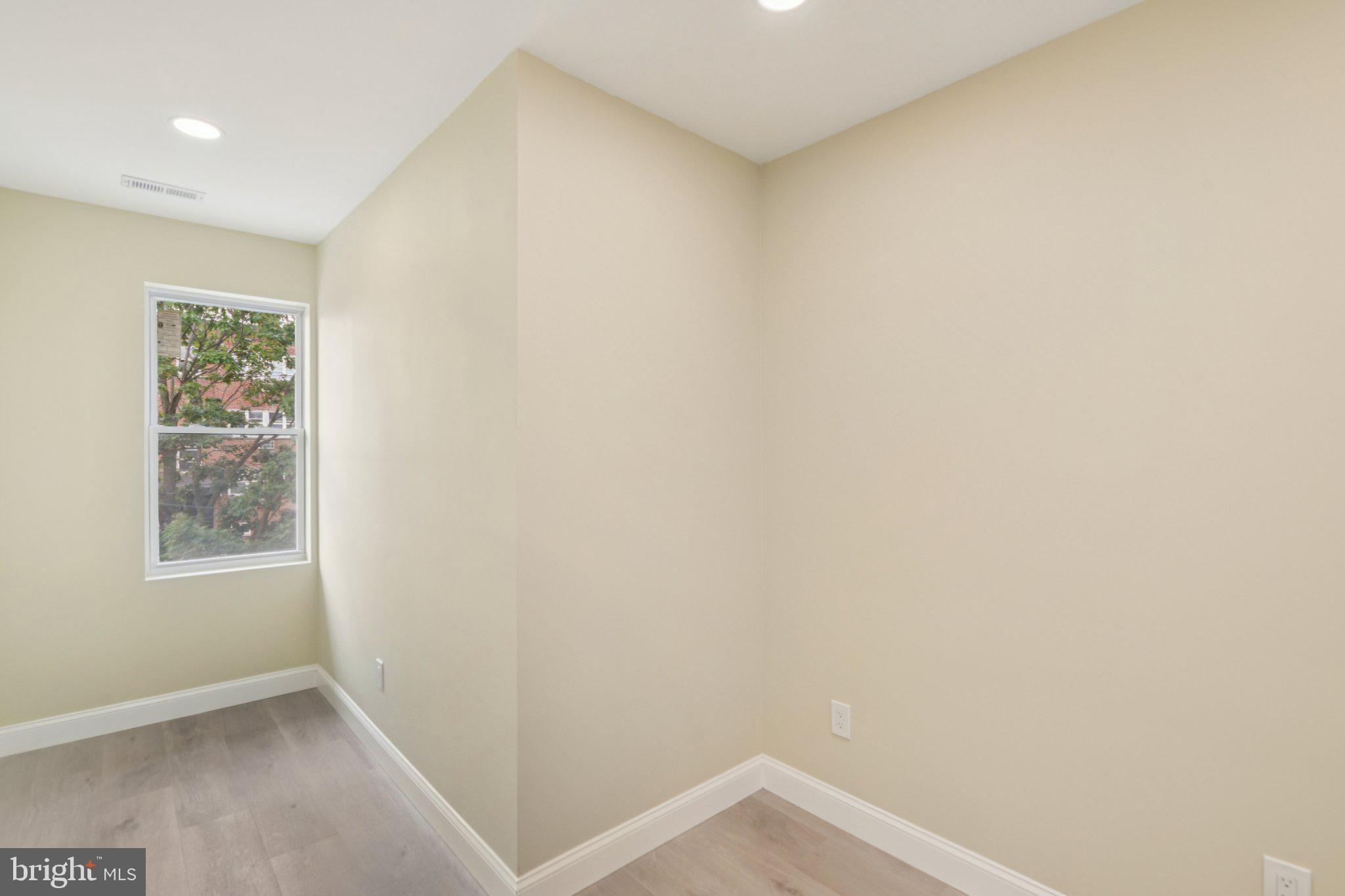 729 Madison Street Northwest Washington, DC 20011 - Photo 29 of 59 a view of an empty room
