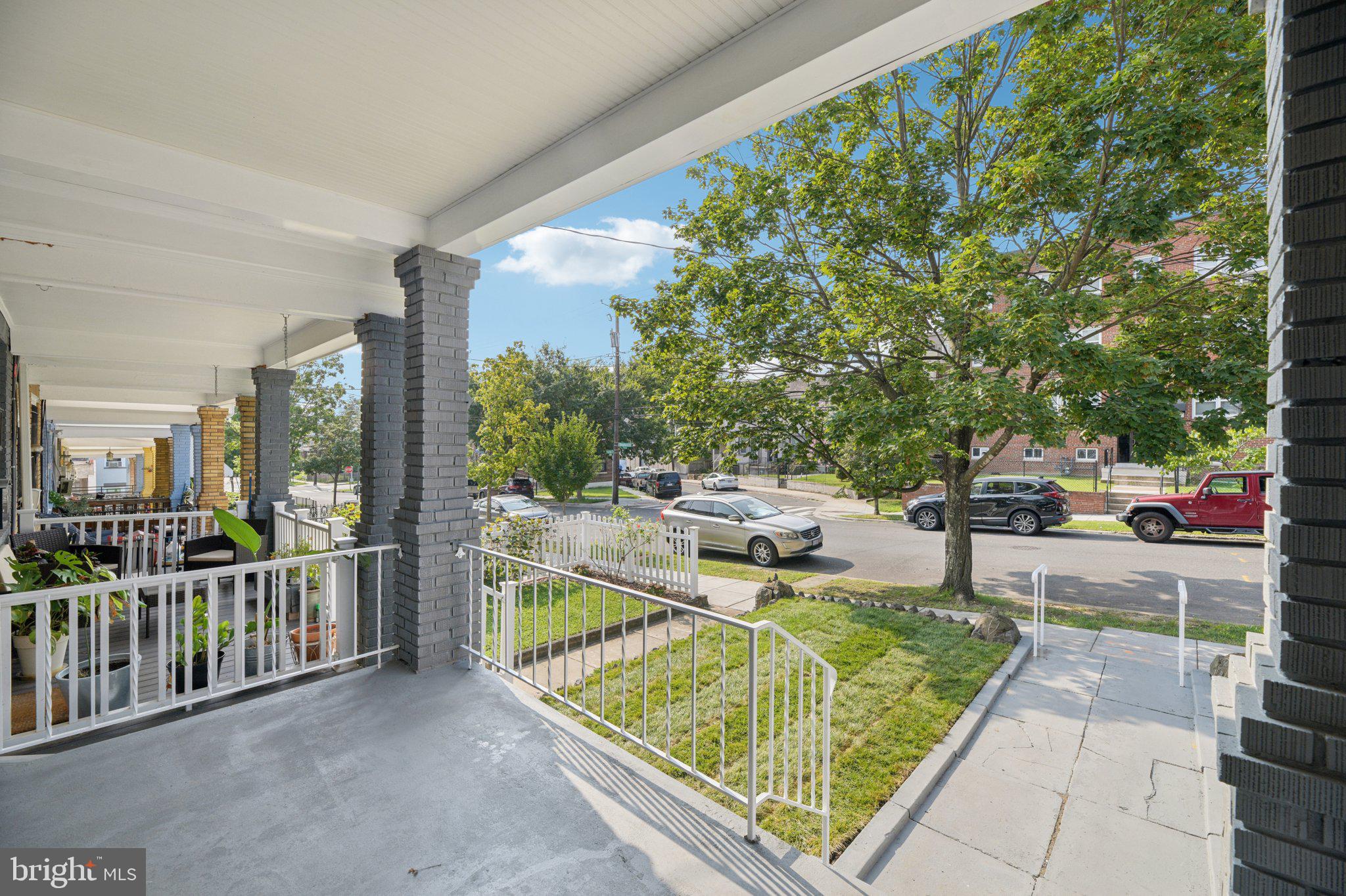 729 Madison Street Northwest Washington, DC 20011 - Photo 3 of 59 a view of a patio with a table and chairs