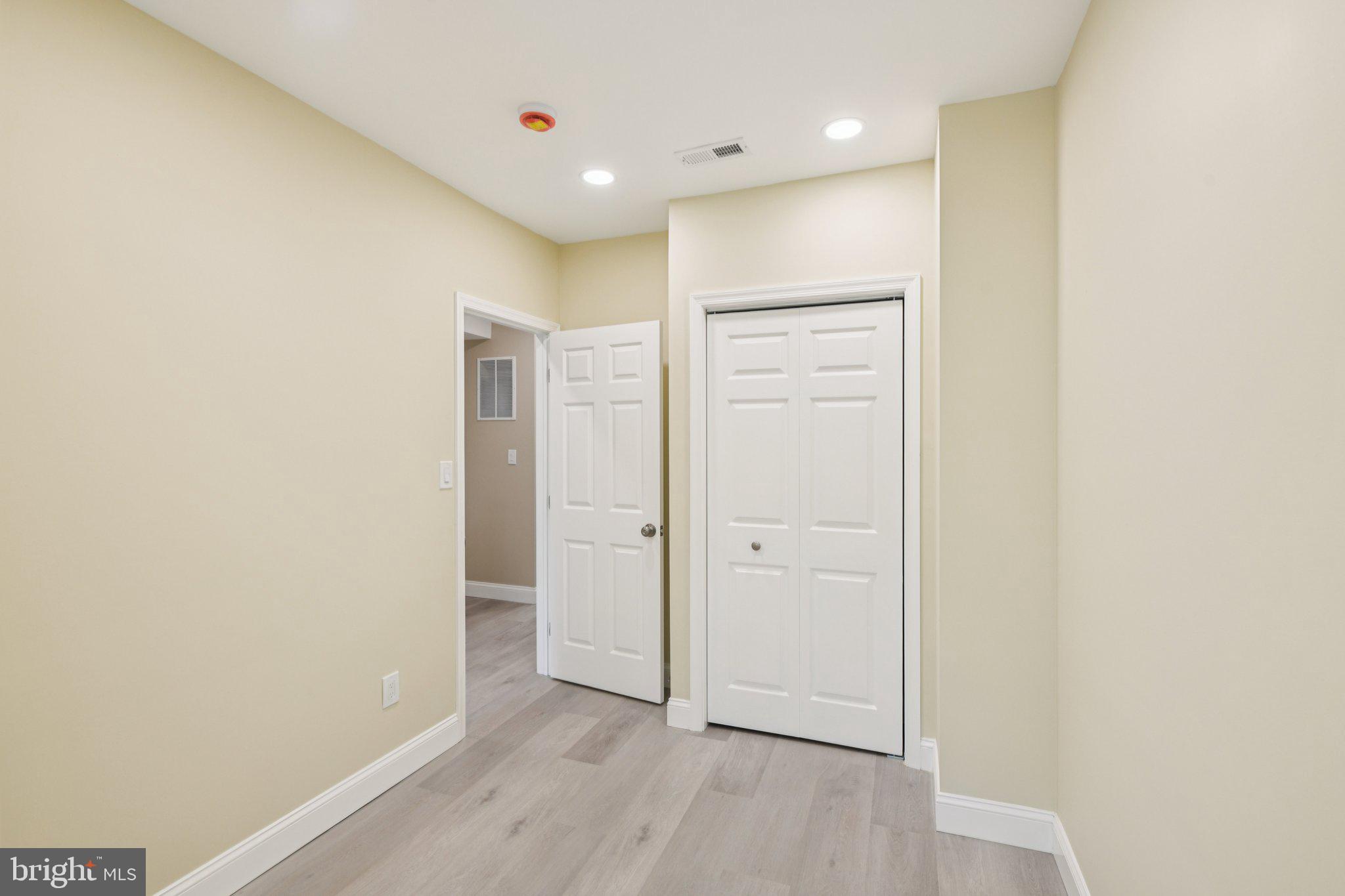 729 Madison Street Northwest Washington, DC 20011 - Photo 31 of 59 a view of a hallway with wooden floor