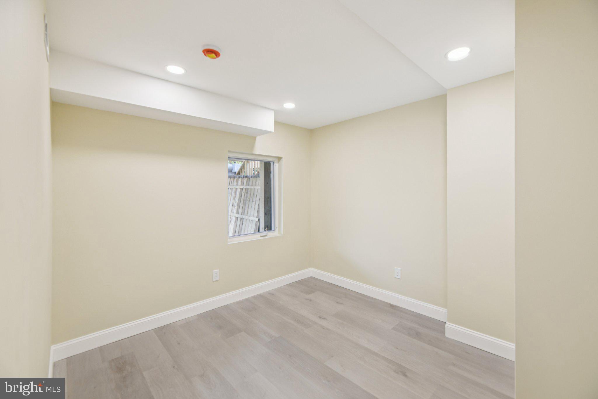 729 Madison Street Northwest Washington, DC 20011 - Photo 39 of 59 a view of a room with wooden floor and window