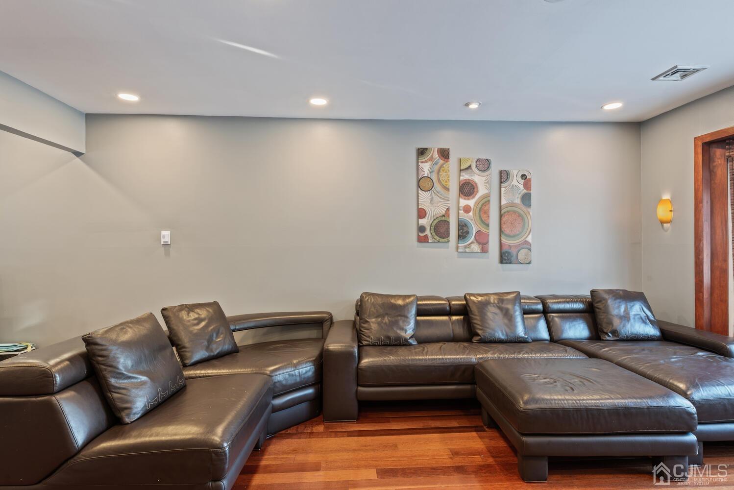19 Larchmont Road Edison, NJ 08837 - Photo 8 of 30 a living room with furniture and wall painting