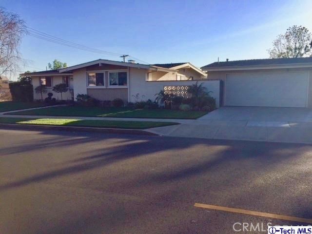 3201 Scott Road Burbank, CA 91504 - Photo 1 of 1 a front view of a house with a yard
