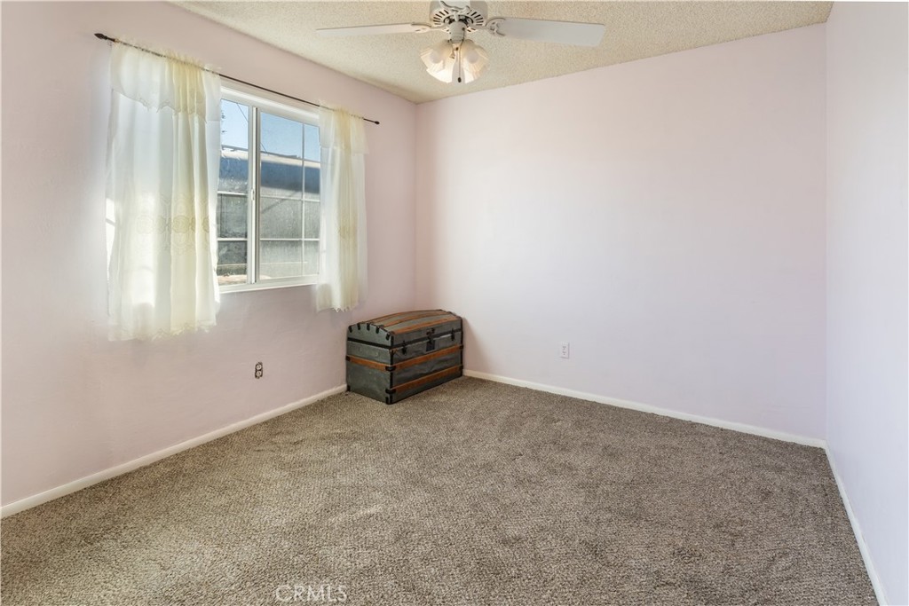 766 South 6th Street Grover Beach, CA 93433 - Photo 7 of 20 an empty room with a window