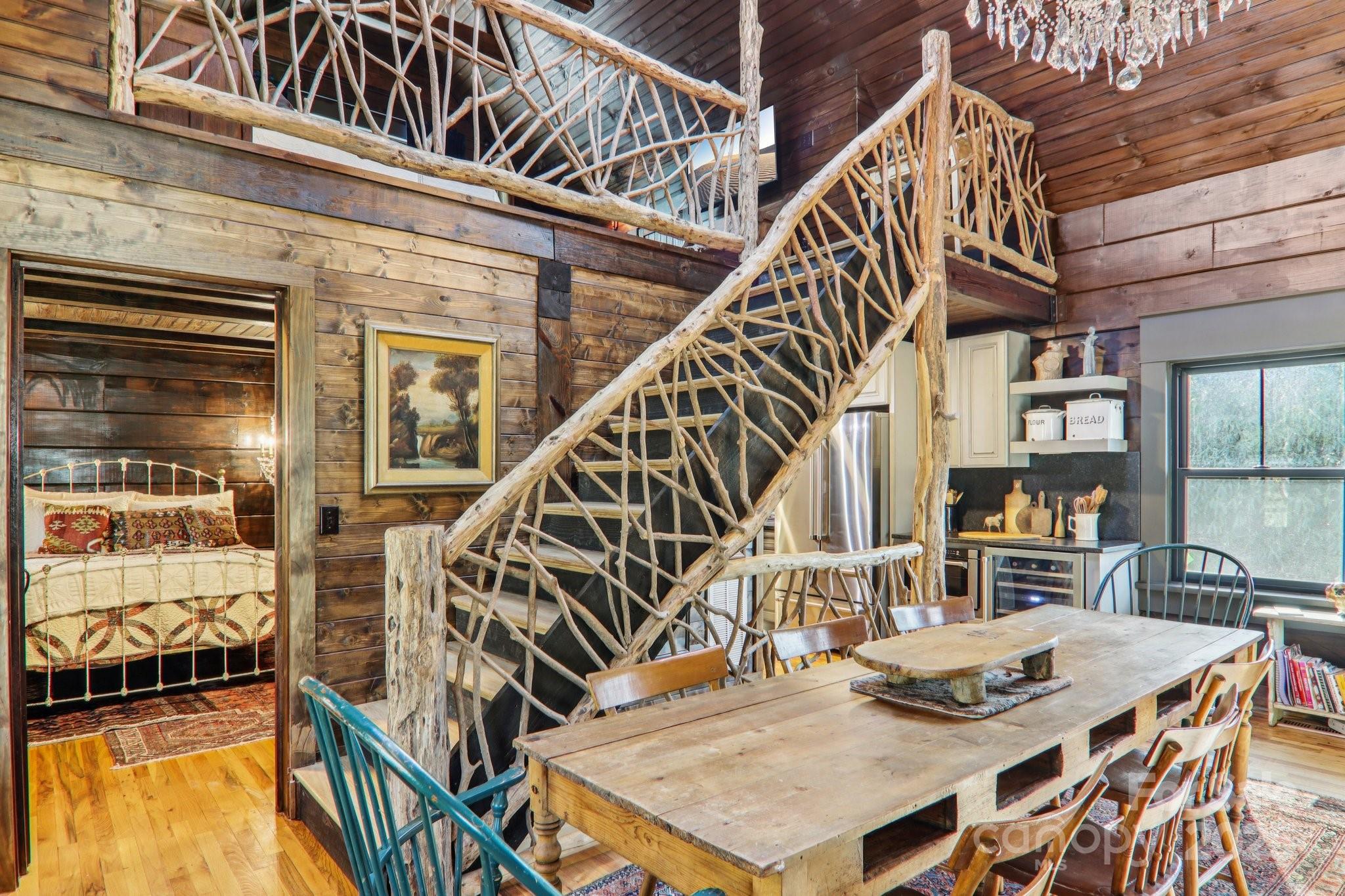 408 Little Elbow Mountain Road Lake Toxaway, NC 28747 - Photo 12 of 48 a view of entryway and hall with wooden floor