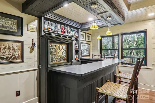 a kitchen with a stove and a refrigerator