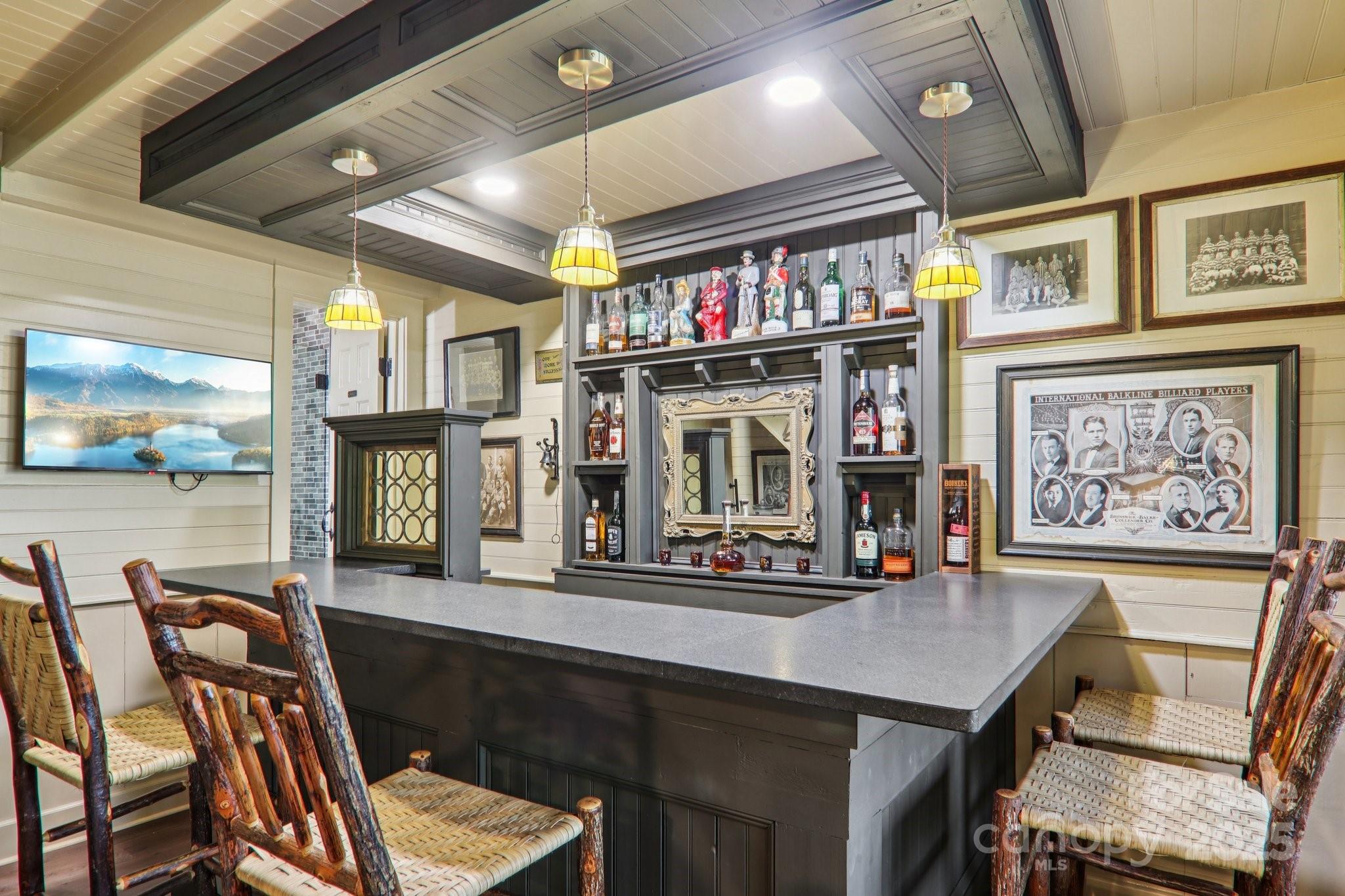 408 Little Elbow Mountain Road Lake Toxaway, NC 28747 - Photo 22 of 48 a dining room with furniture and window
