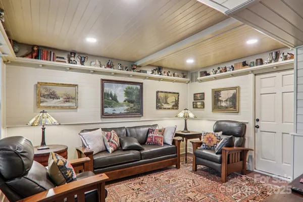 a living room with furniture and a couch