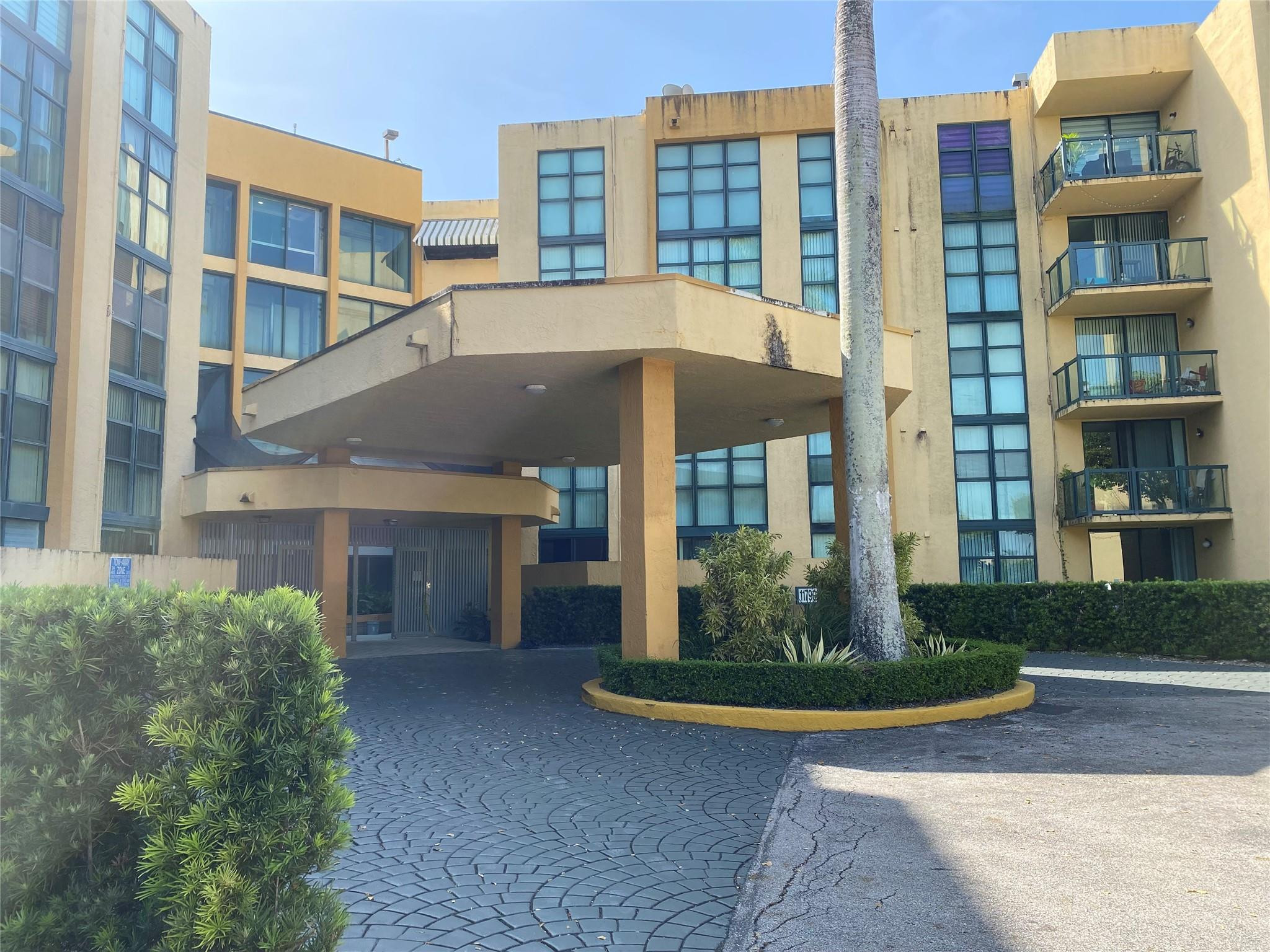 a view of a building with a street