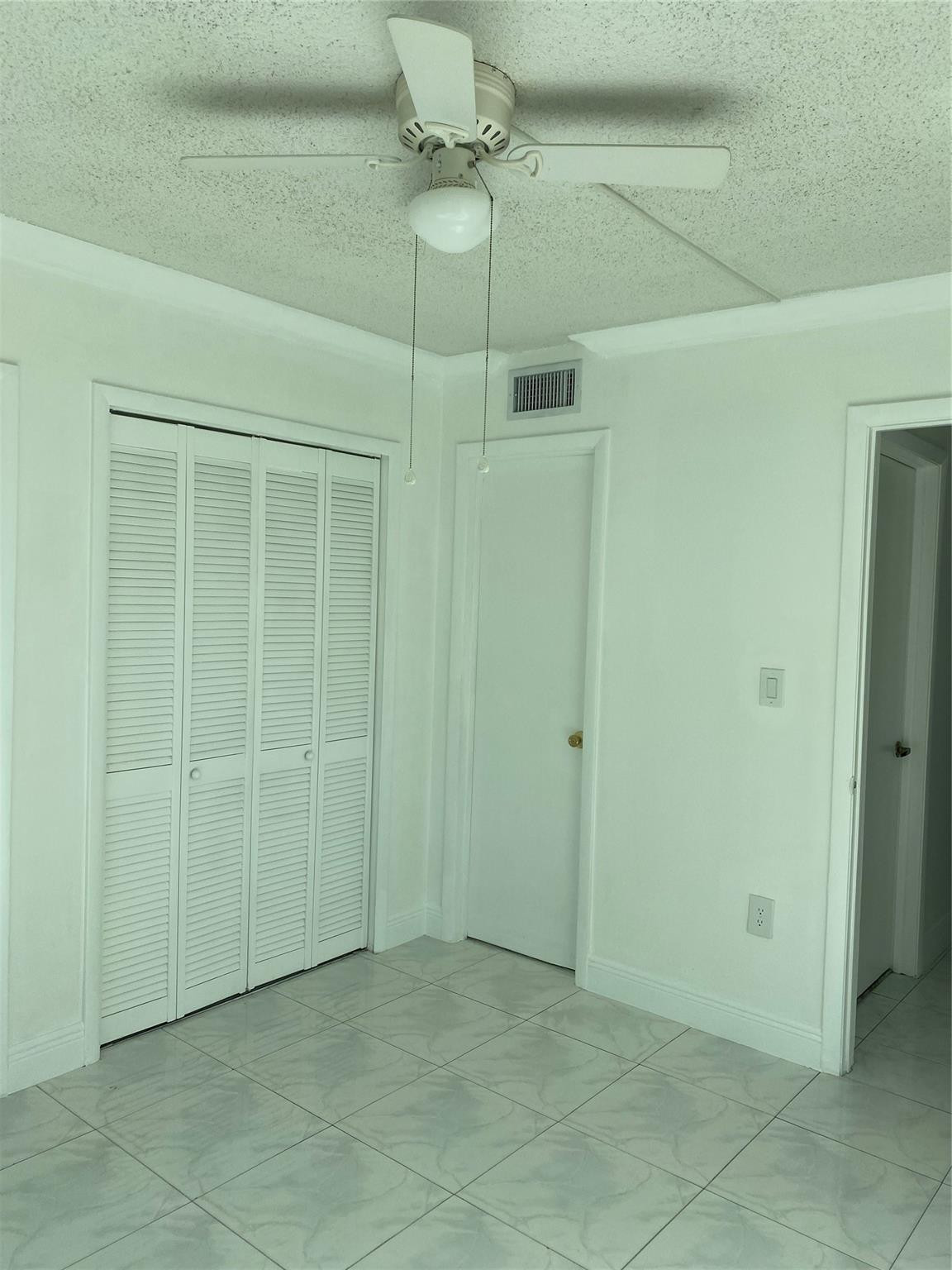 11790 Southwest 18th Street, Unit 106 Miami, FL 33175 - Photo 12 of 23 a view of an empty room