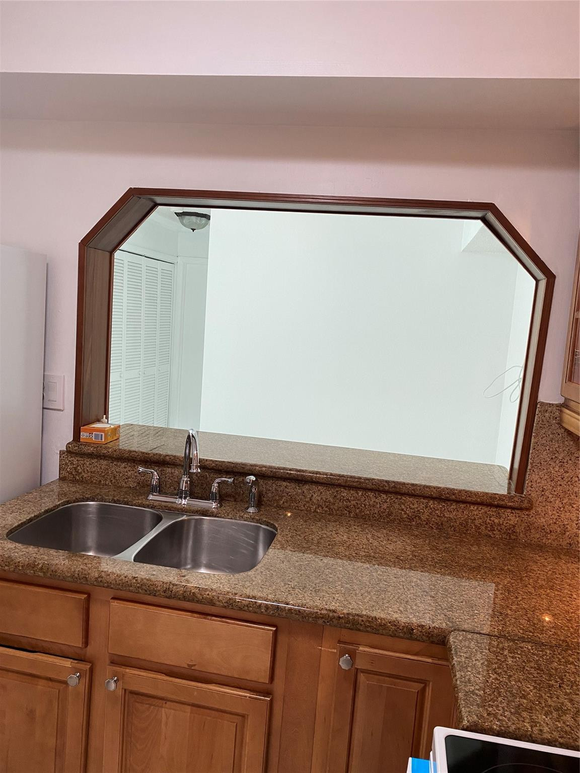 11790 Southwest 18th Street, Unit 106 Miami, FL 33175 - Photo 20 of 23 a bathroom with a sink and a mirror