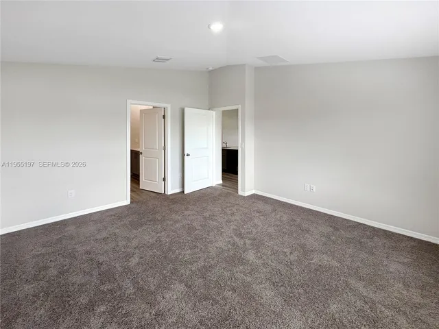 an empty room with an entryway
