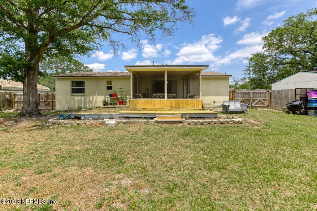 8490 Walden Road Jacksonville, FL 32244 - Photo 33 of 34 a house view with swimming pool in front of it