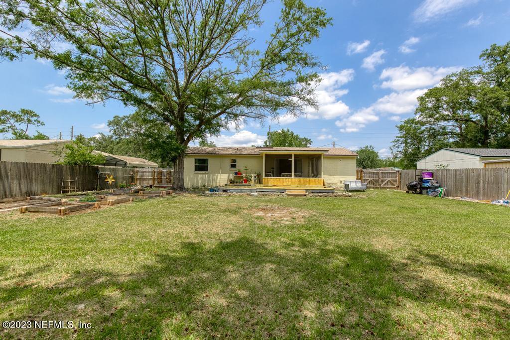 8490 Walden Road Jacksonville, FL 32244 - Photo 34 of 34 a front view of a house with a garden
