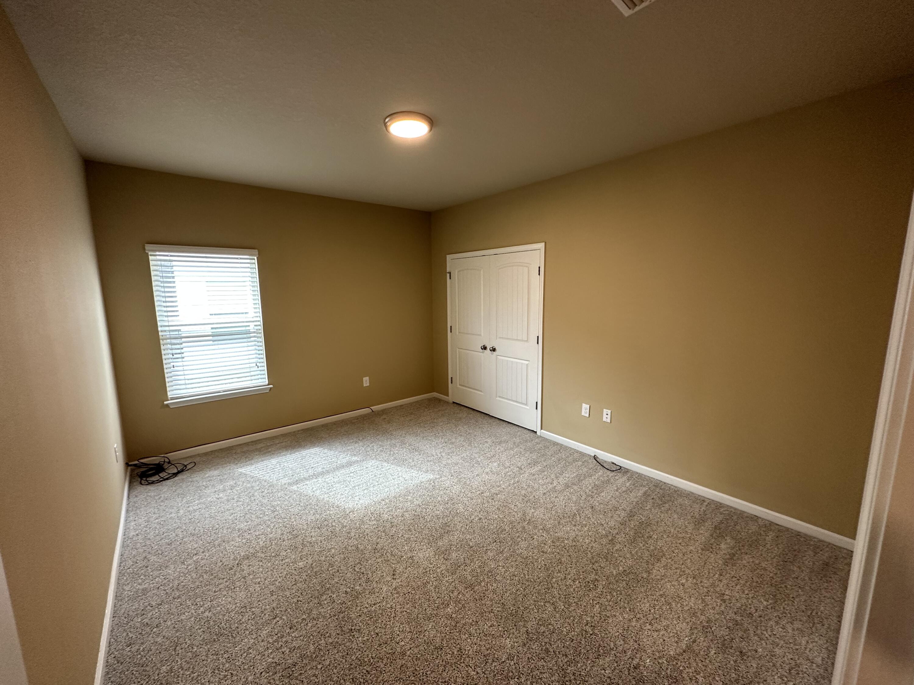260 Cornelia Street Freeport, FL 32439 - Photo 12 of 31 a view of an empty room with a window