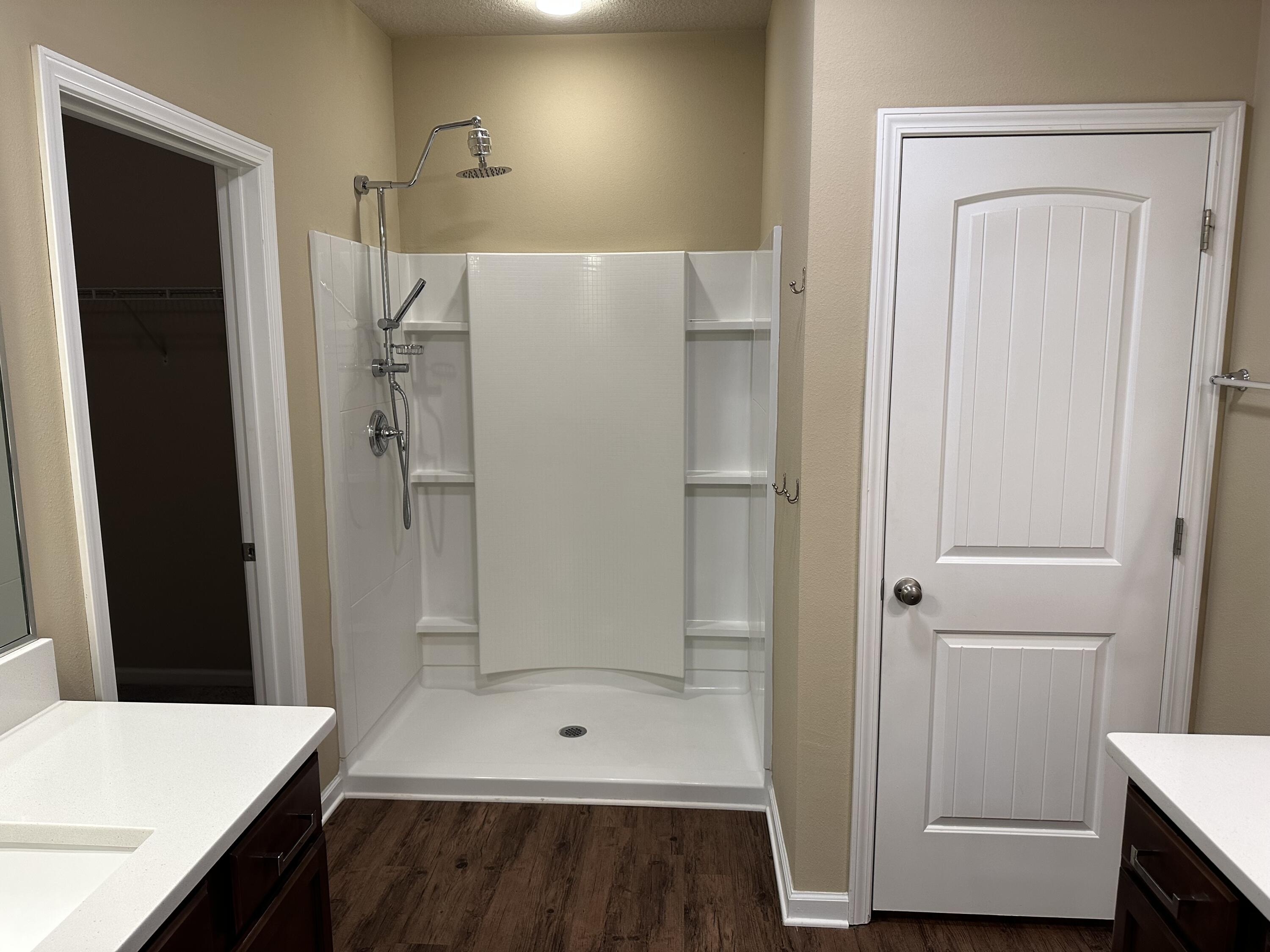 260 Cornelia Street Freeport, FL 32439 - Photo 20 of 31 a bathroom with a shower and a sink