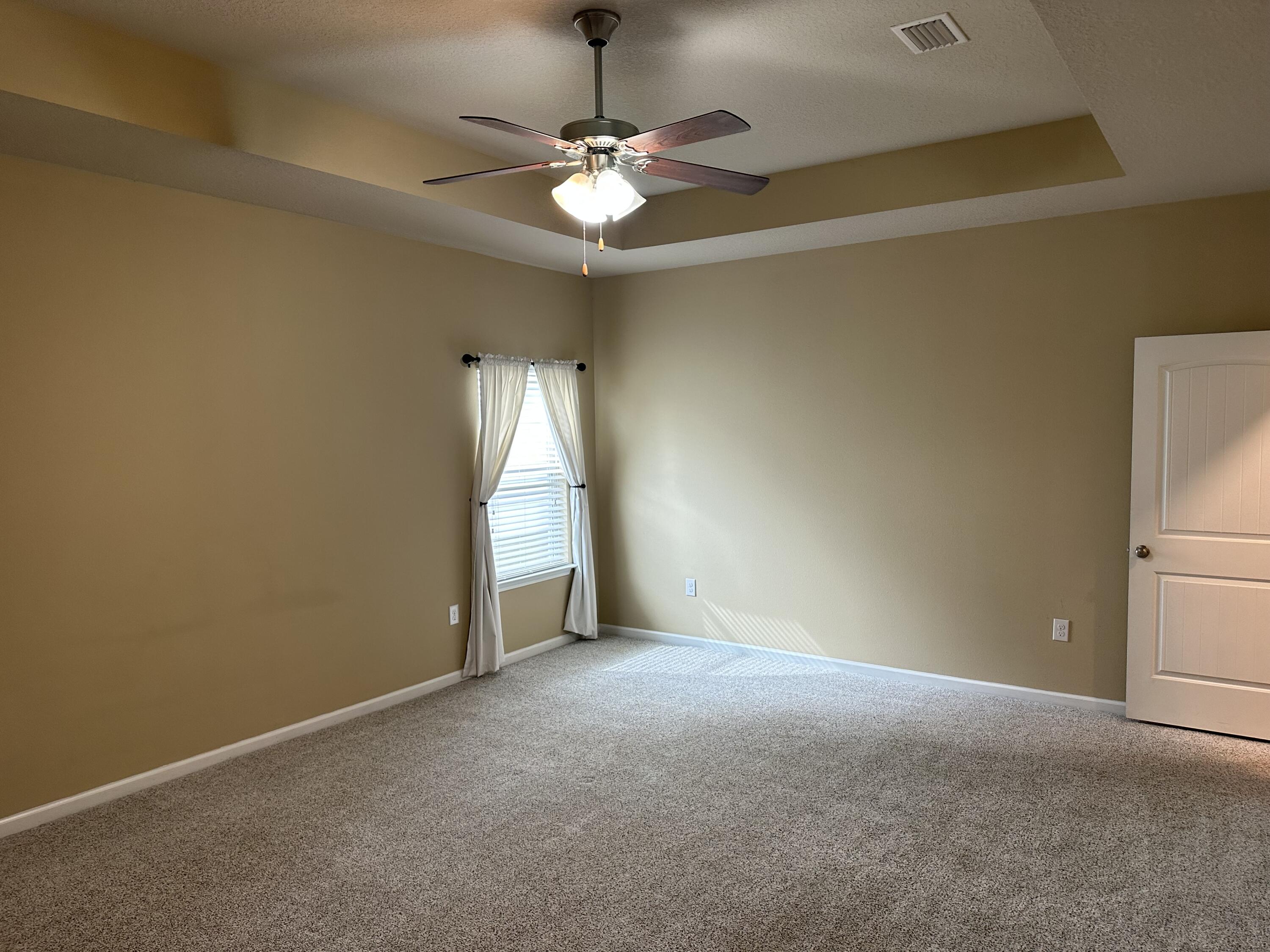 260 Cornelia Street Freeport, FL 32439 - Photo 23 of 31 a view of an empty room with a window