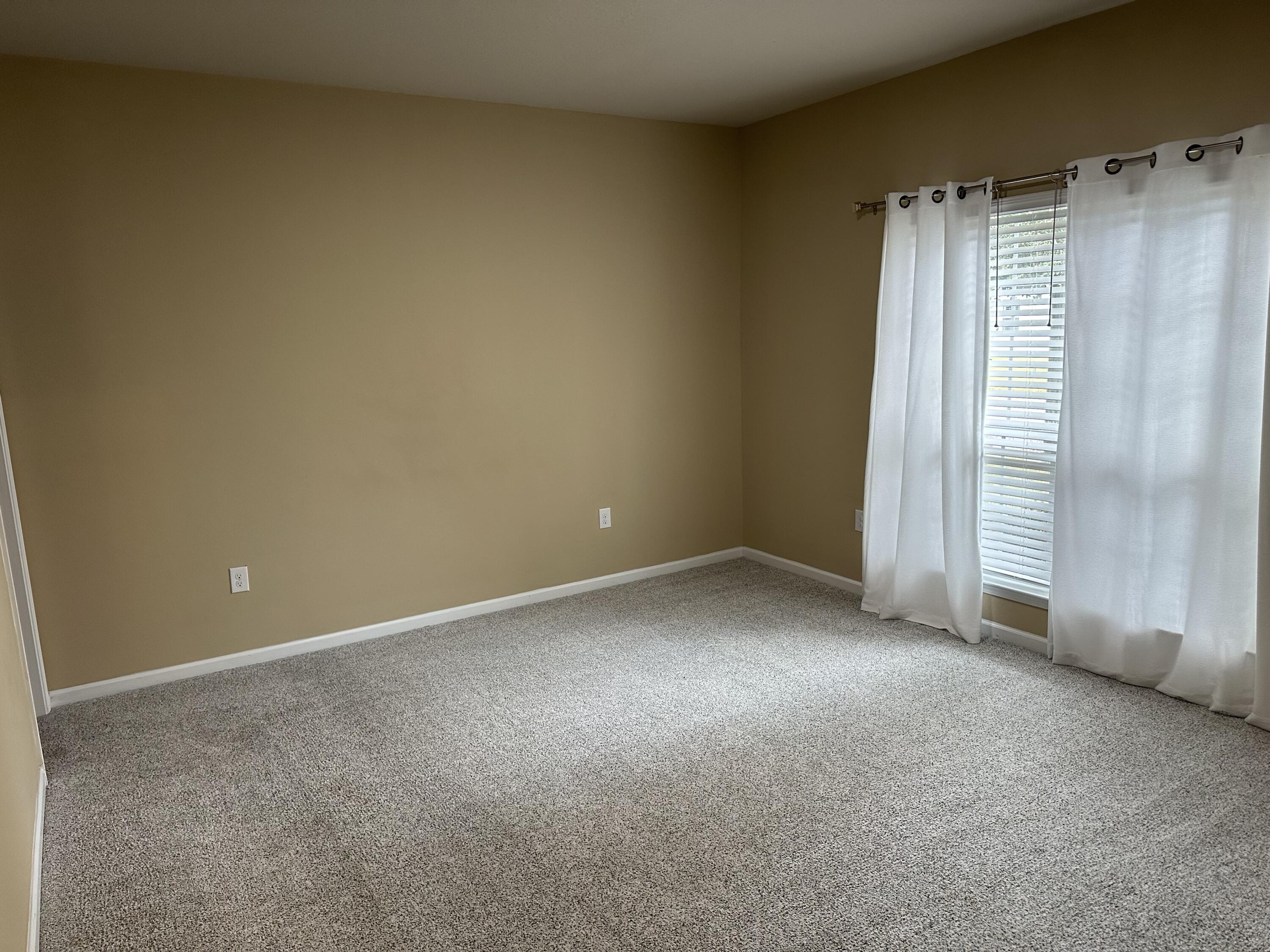 260 Cornelia Street Freeport, FL 32439 - Photo 10 of 31 a view of an empty room with a window