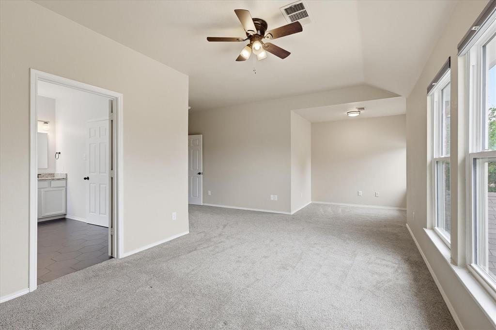 13236 Ridgepointe Road Fort Worth, TX 76244 - Photo 15 of 19 an empty room and chandelier fan