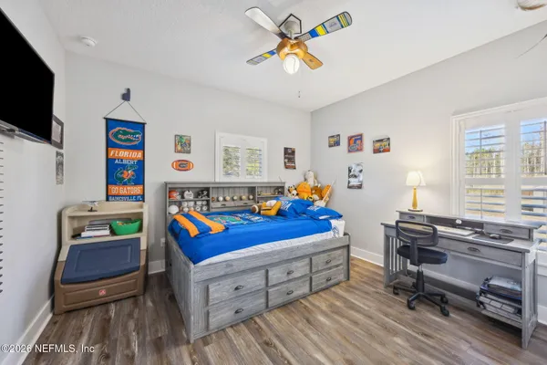 a room with furniture and a rug