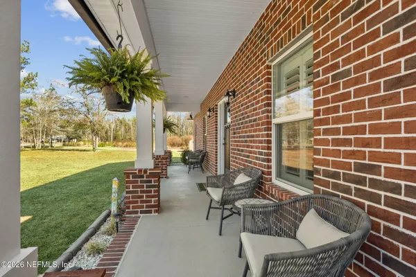 a view of an outdoor sitting area with chairs