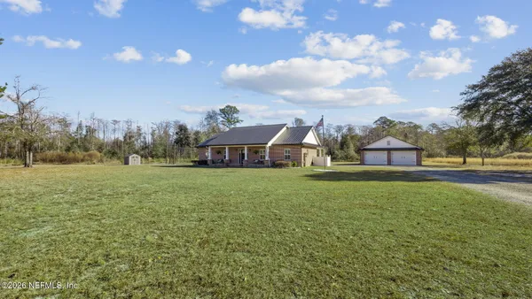 a view of an ocean and city