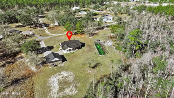 a view of a golf course with a lake
