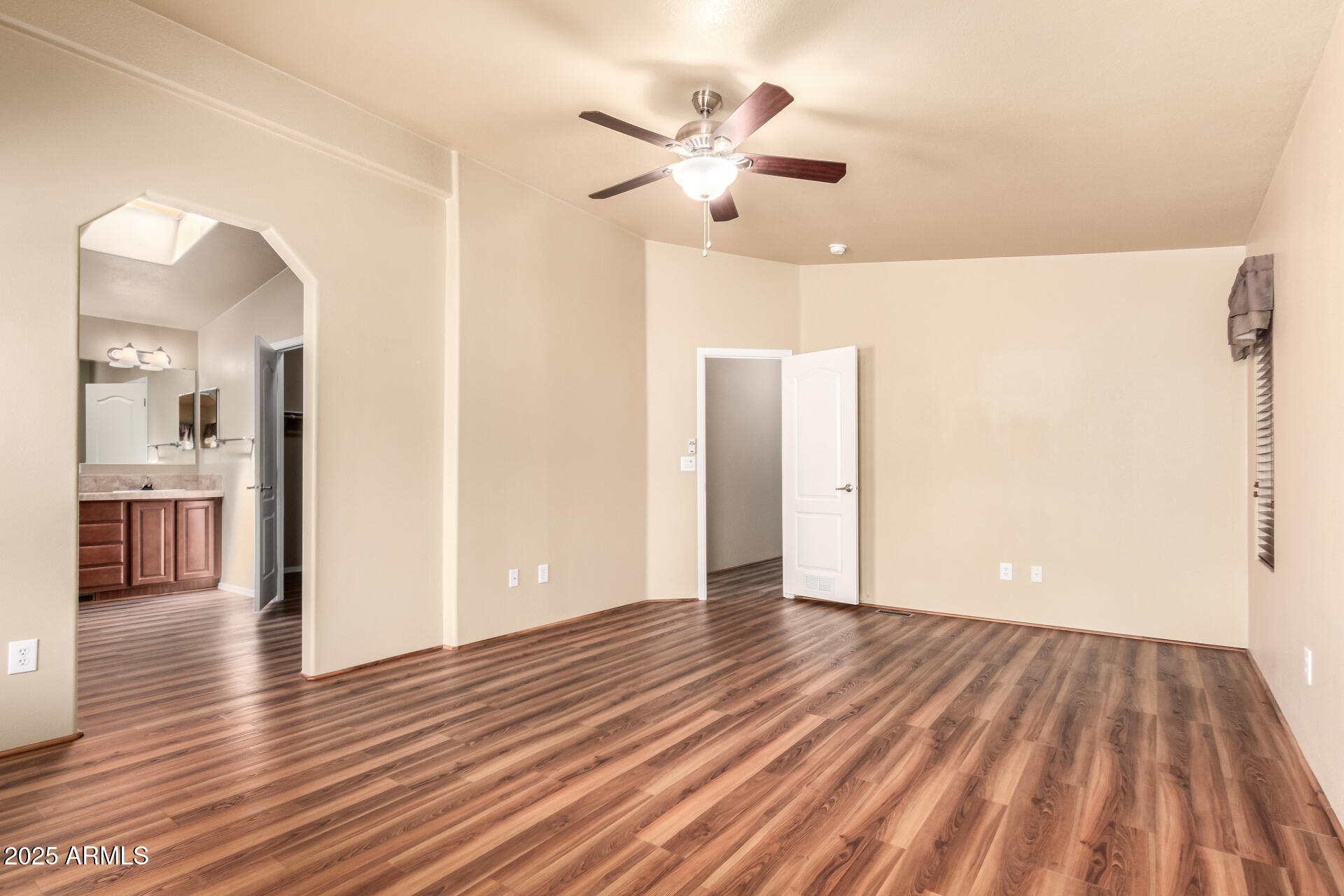 2929 East Main Street, Unit 159 Mesa, AZ 85213 - Photo 11 of 30 a view of an empty room and wooden floor