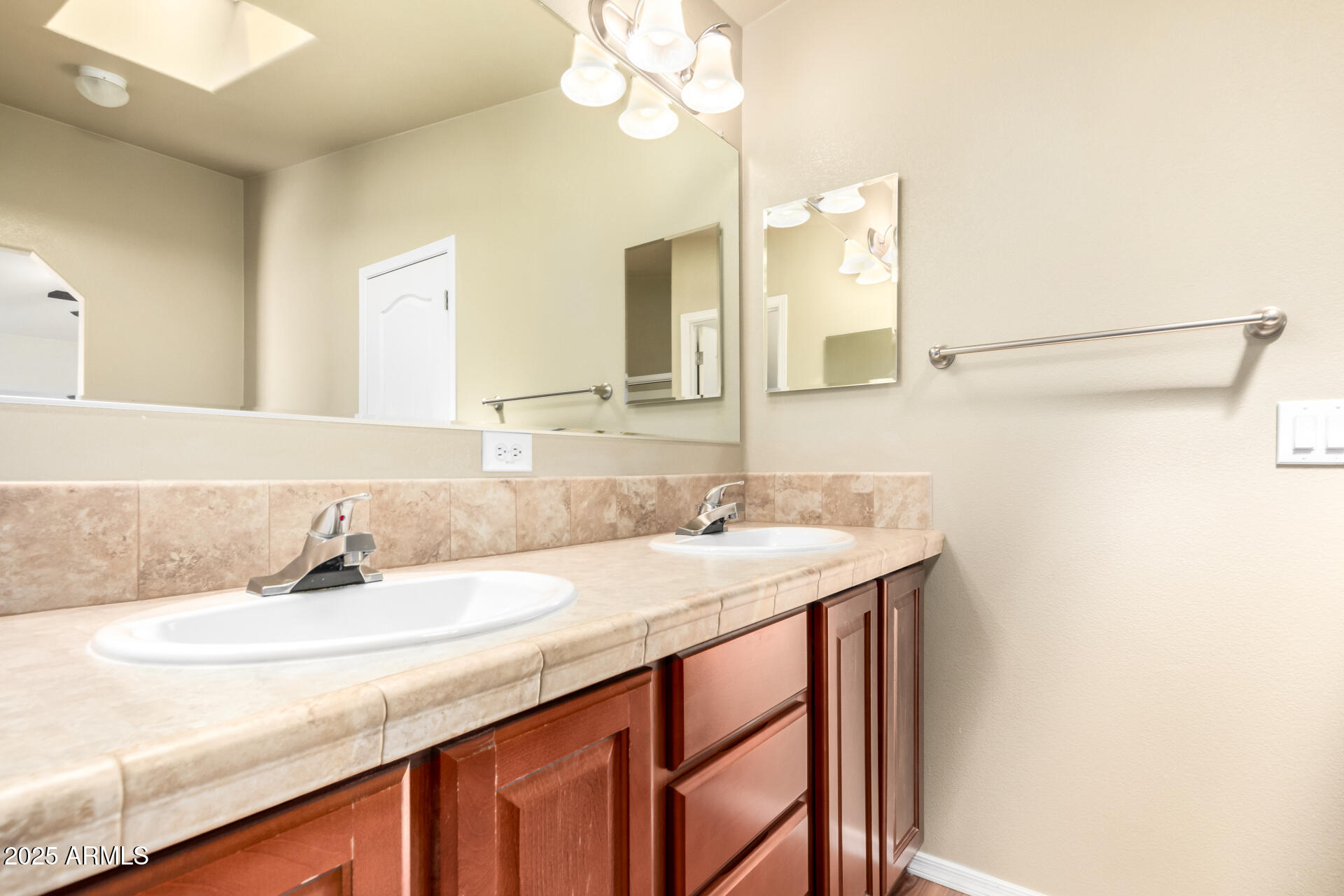 2929 East Main Street, Unit 159 Mesa, AZ 85213 - Photo 13 of 30 a bathroom with a sink and a mirror