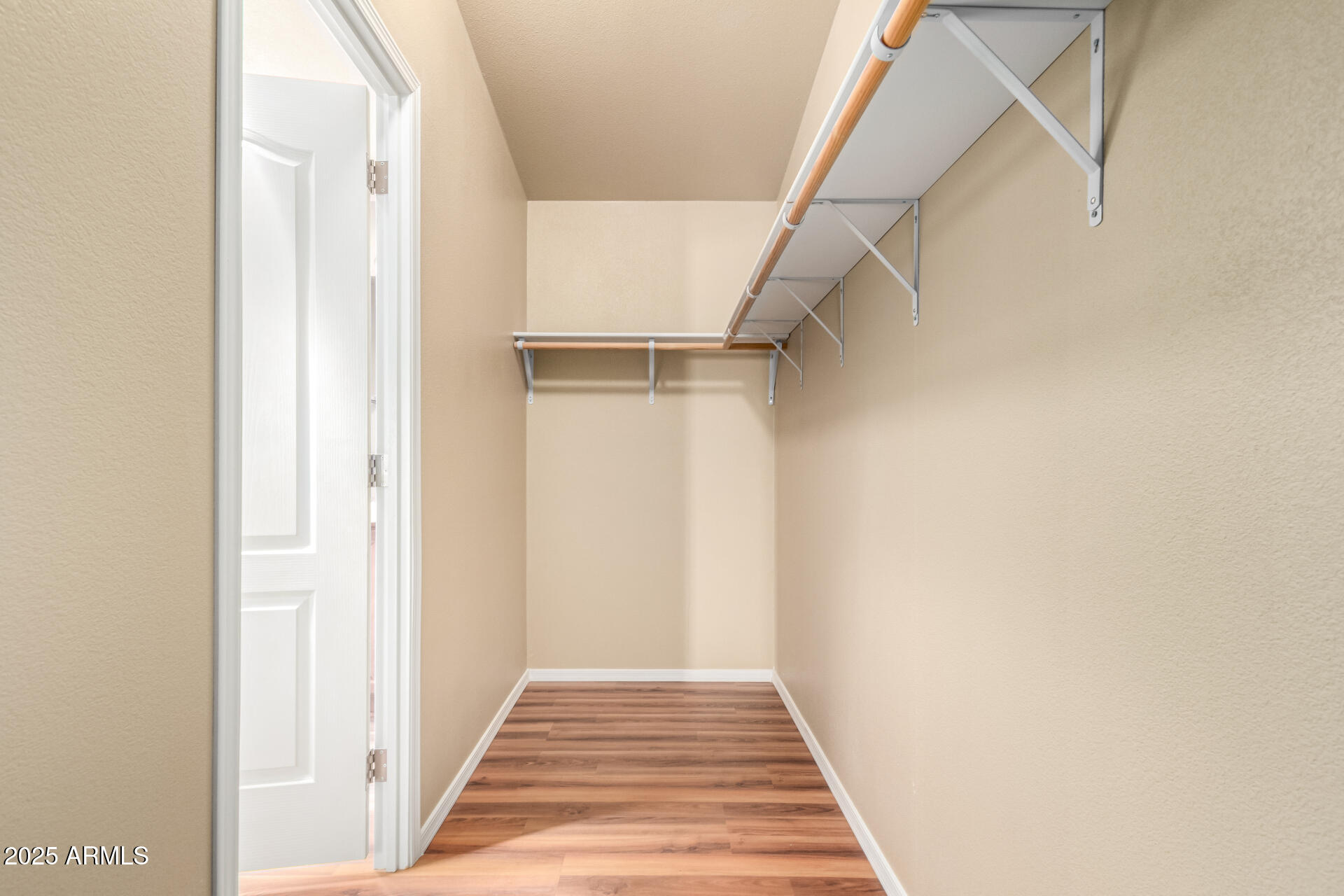 2929 East Main Street, Unit 159 Mesa, AZ 85213 - Photo 16 of 30 a view of a hallway with wooden floor and entryway