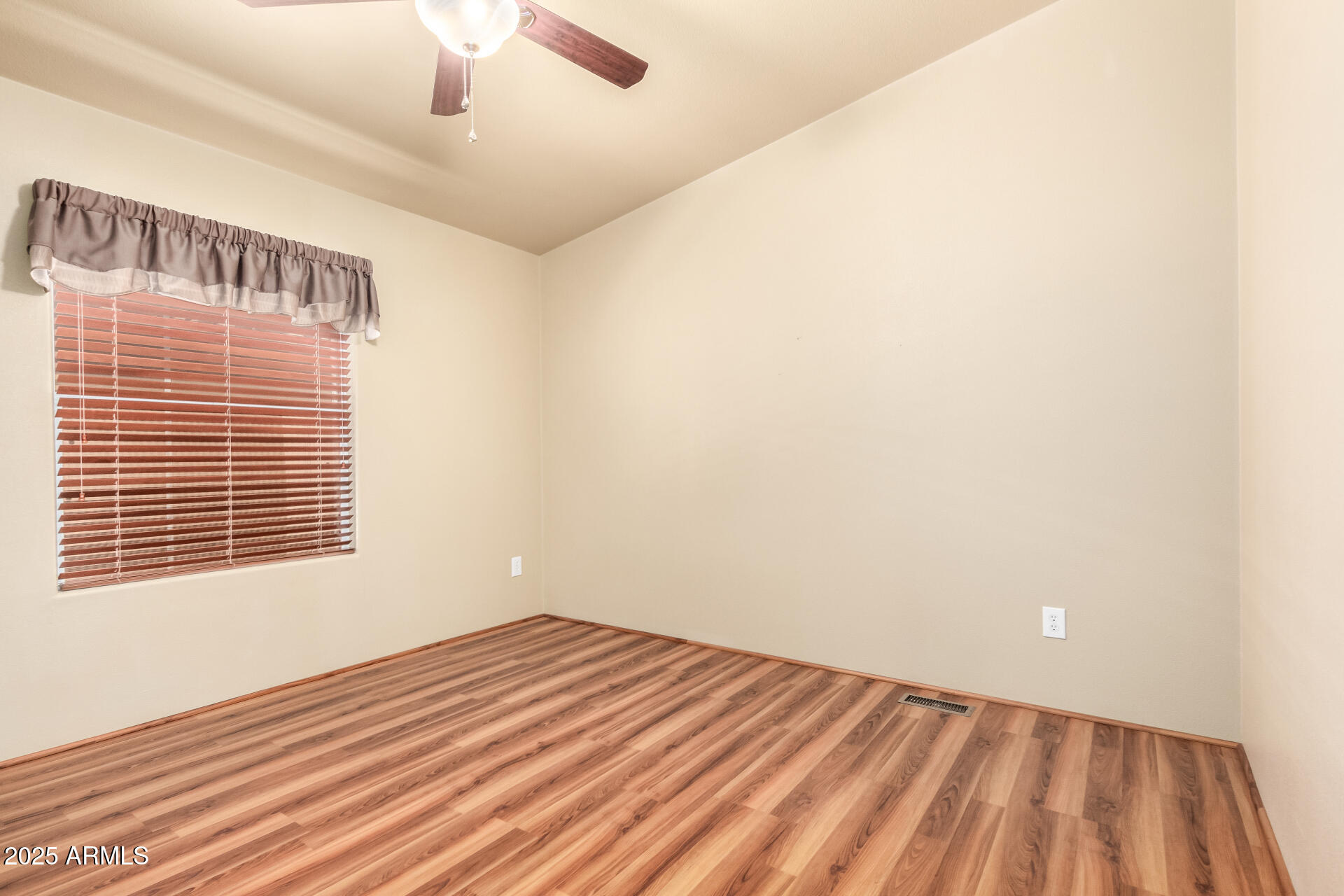 2929 East Main Street, Unit 159 Mesa, AZ 85213 - Photo 17 of 30 a view of an empty room with a window
