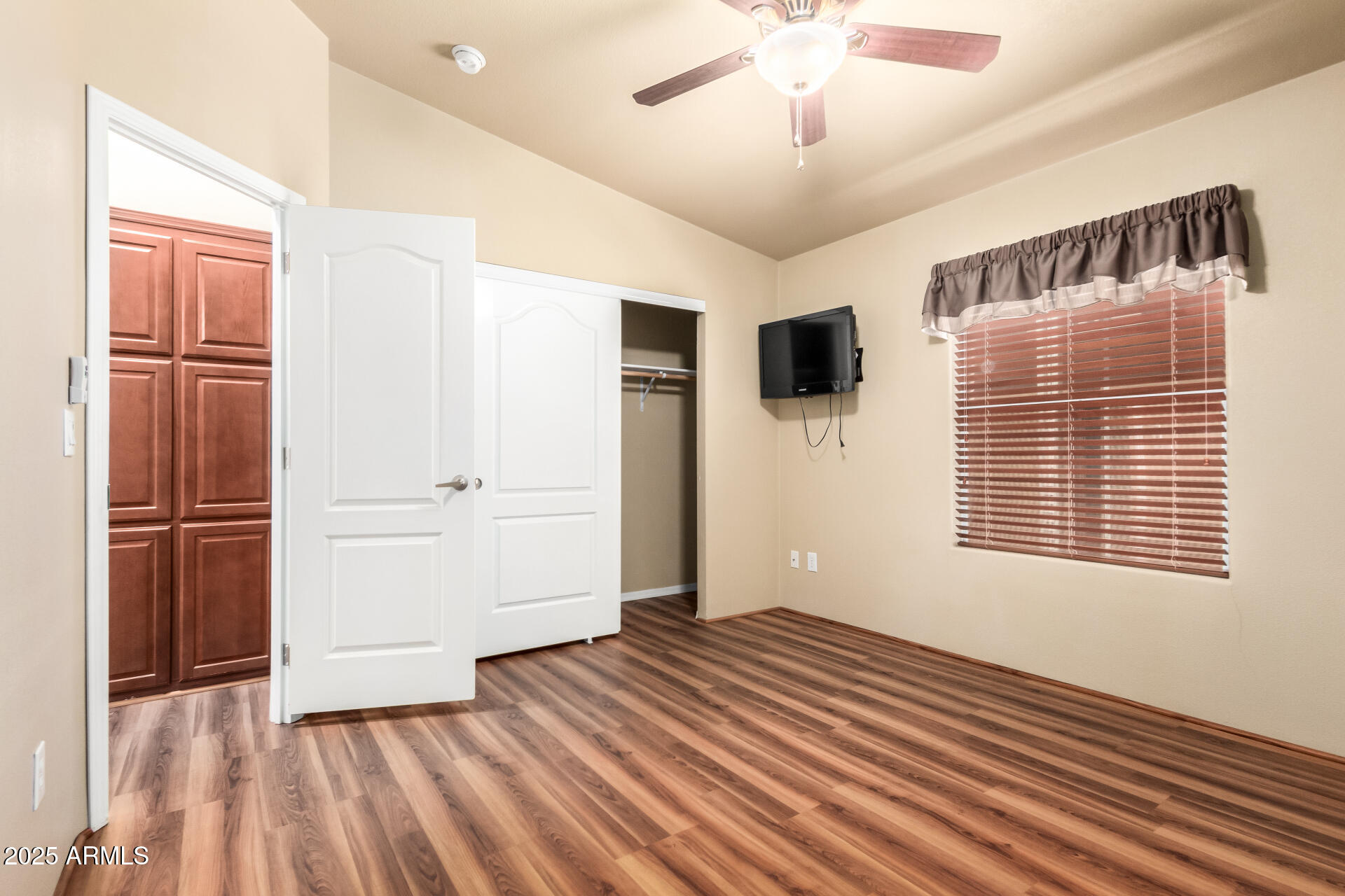 2929 East Main Street, Unit 159 Mesa, AZ 85213 - Photo 18 of 30 wooden floor in an empty room with a window