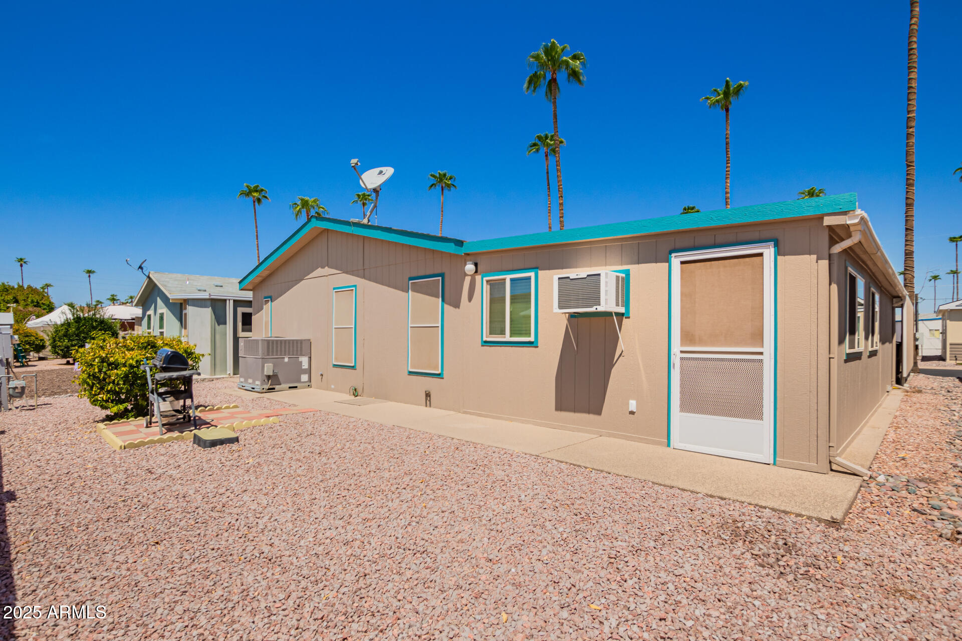 2929 East Main Street, Unit 159 Mesa, AZ 85213 - Photo 29 of 30 a view of a house with a patio