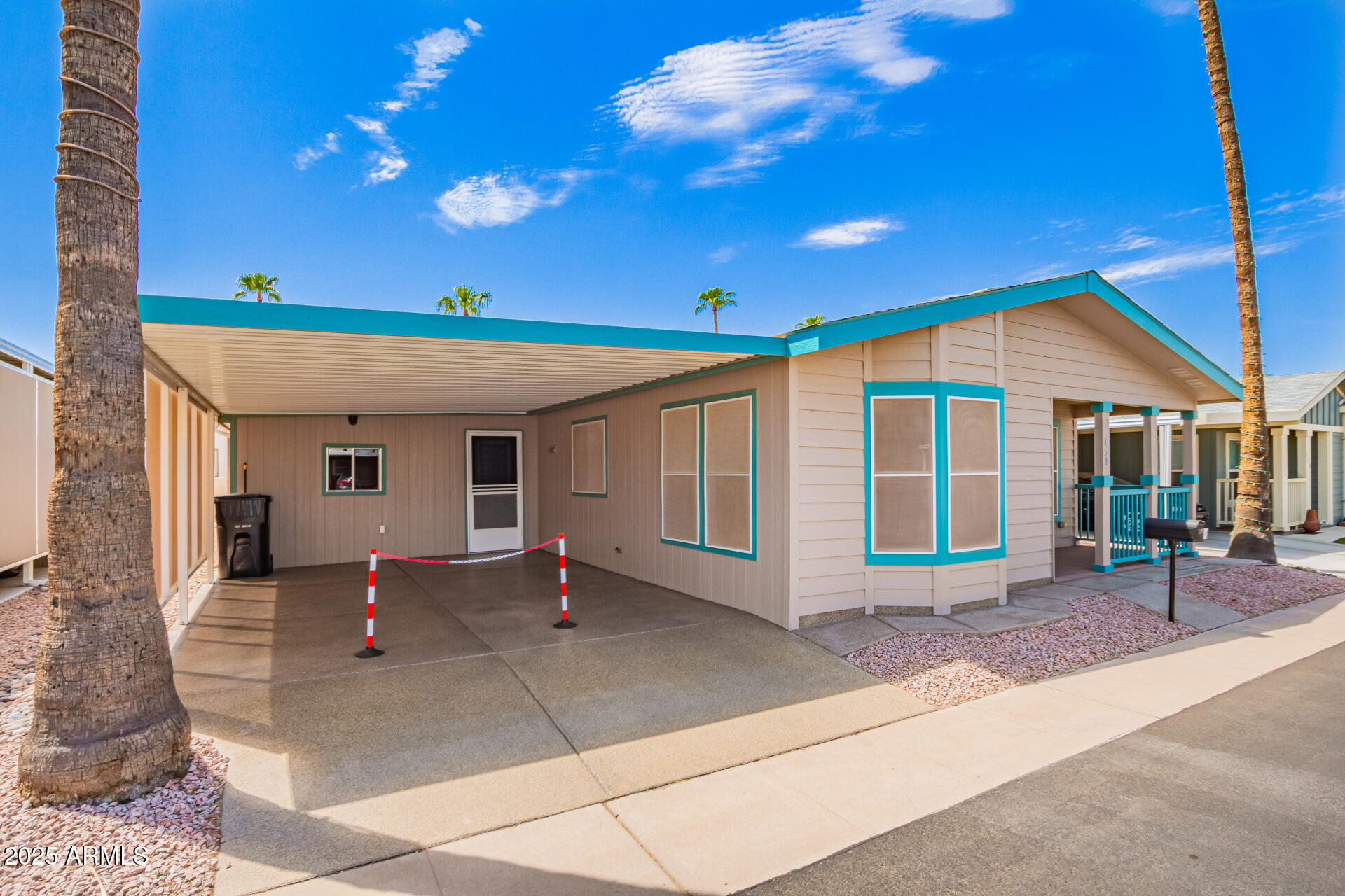 2929 East Main Street, Unit 159 Mesa, AZ 85213 - Photo 30 of 30 a view of a building with sitting area