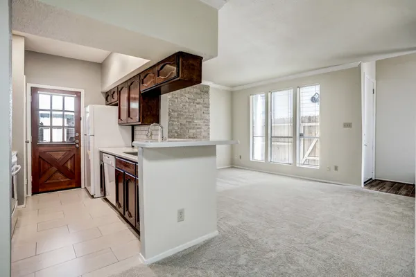 a view of kitchen with washer and dryer
