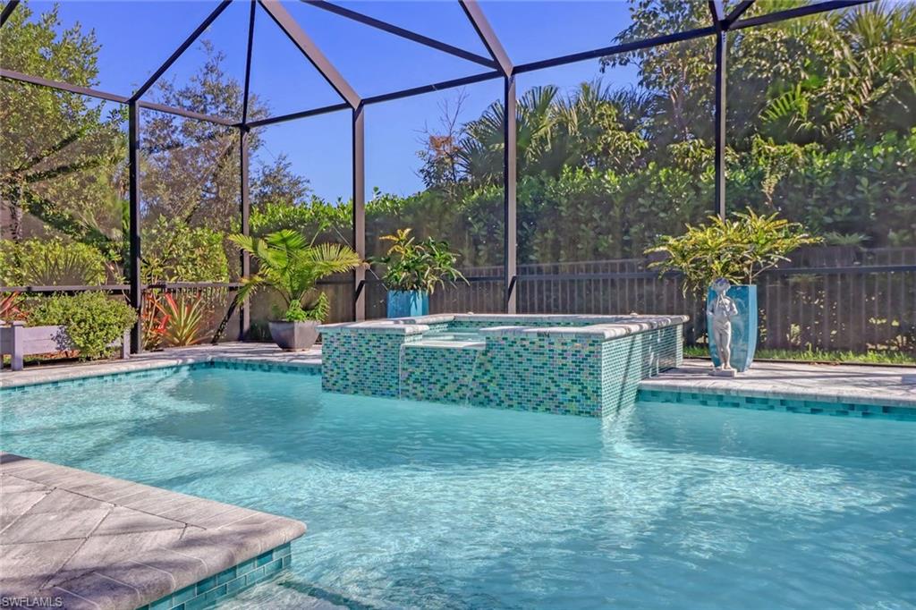 4617 Azalea Drive Naples, FL 34119 - Photo 24 of 34 a view of a house with a yard