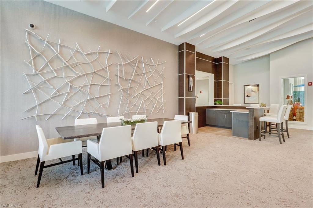 4617 Azalea Drive Naples, FL 34119 - Photo 32 of 34 a view of a livingroom with furniture and window