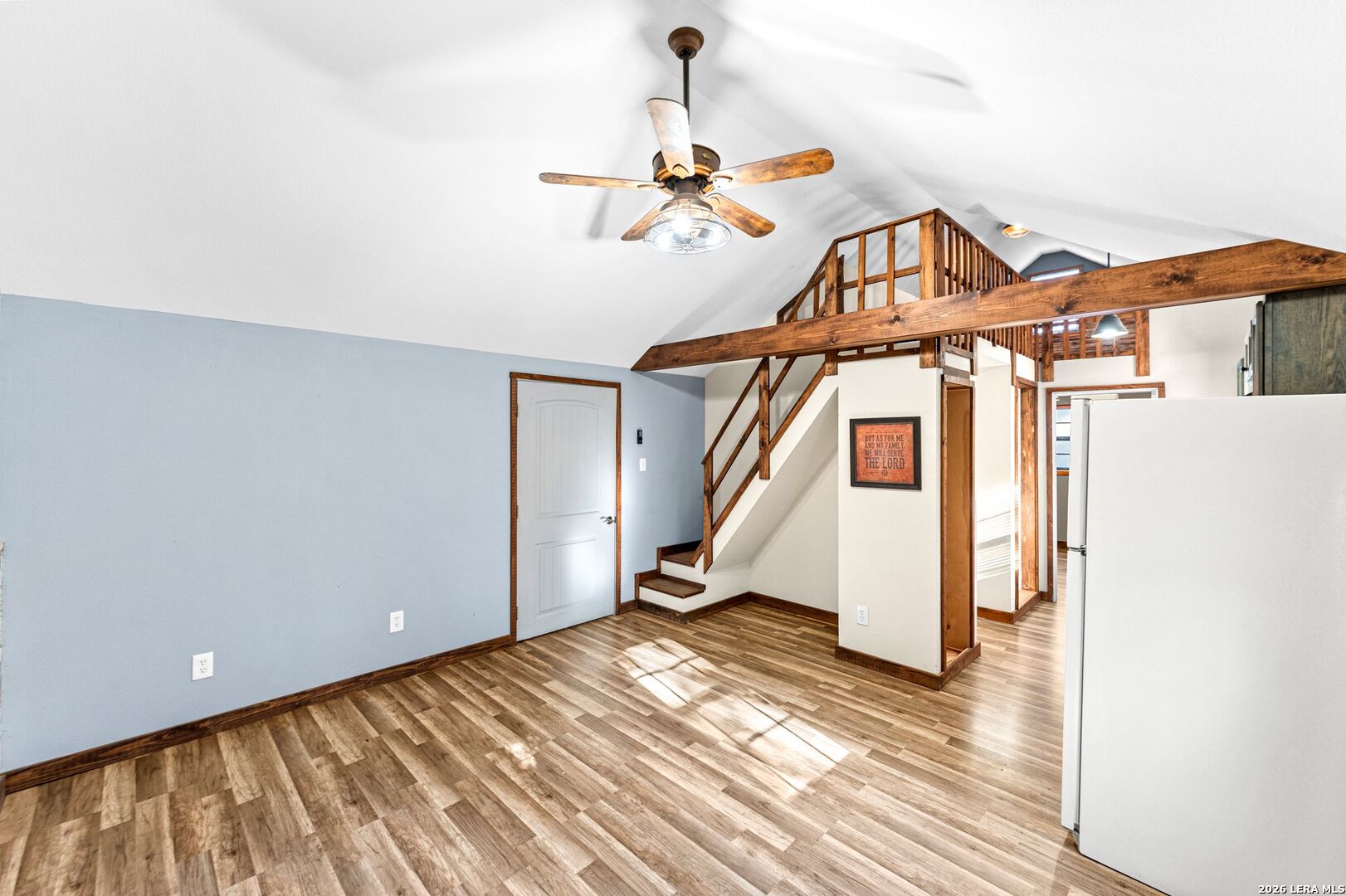 297 Chaparral Drive Bandera, TX 78003 - Photo 11 of 19 a view of a room with wooden floor and stairs