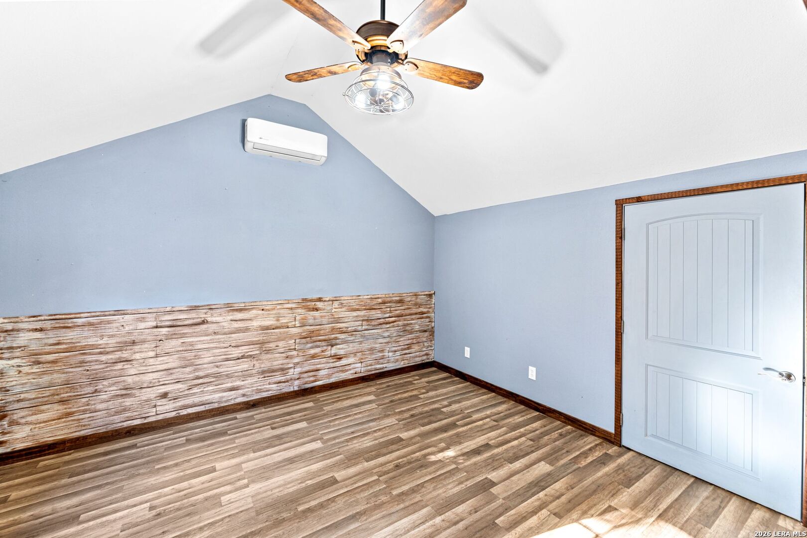 297 Chaparral Drive Bandera, TX 78003 - Photo 14 of 19 wooden floor in an empty room