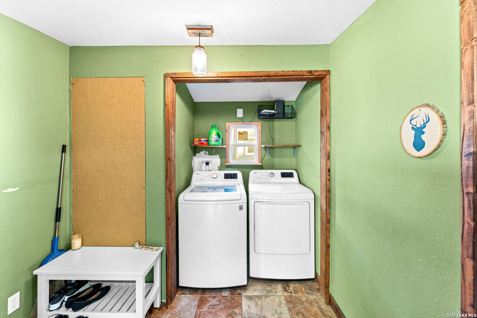297 Chaparral Drive Bandera, TX 78003 - Photo 16 of 19 a utility room with dryer and washer