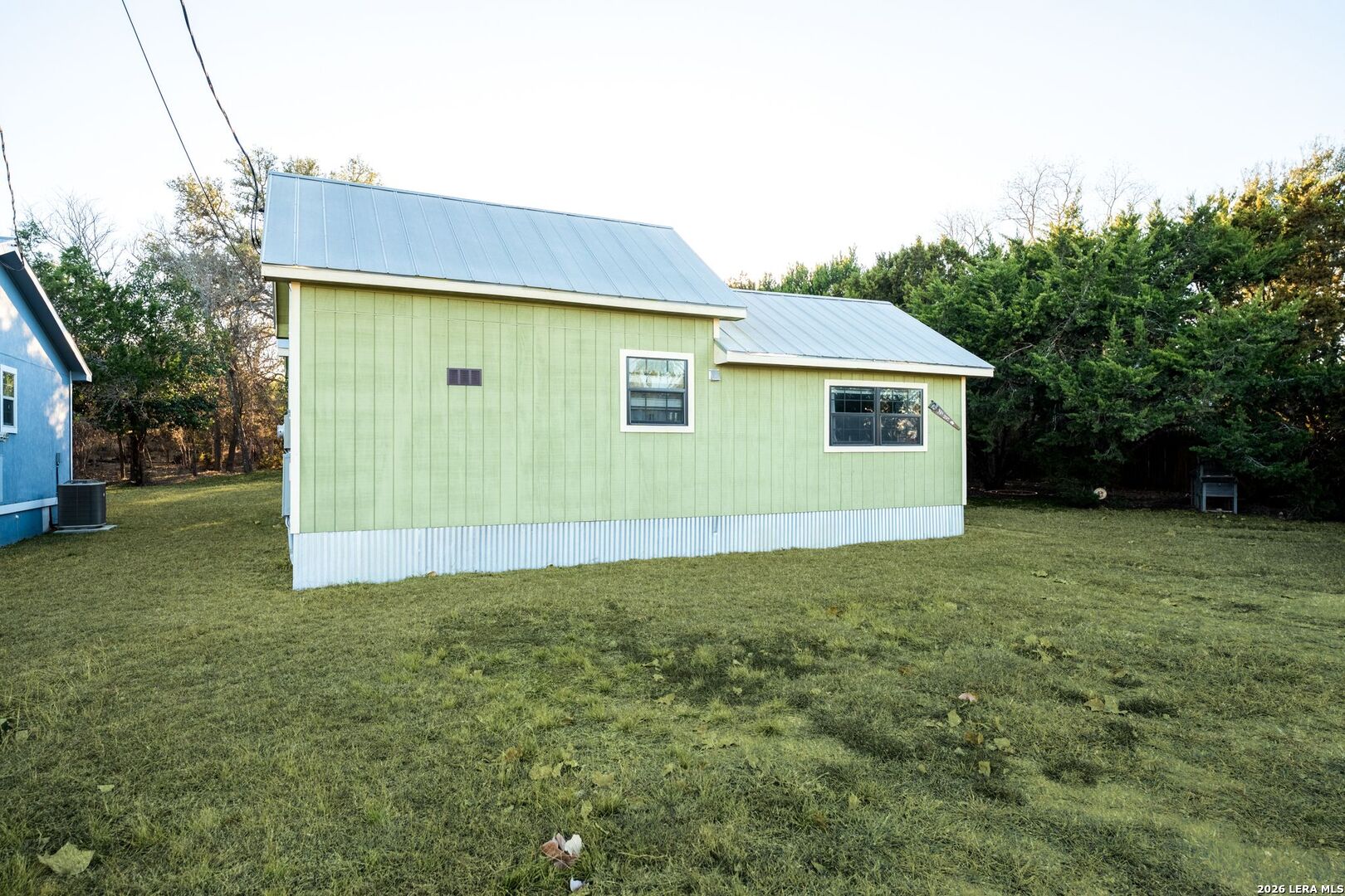 297 Chaparral Drive Bandera, TX 78003 - Photo 19 of 19 a backyard of a house