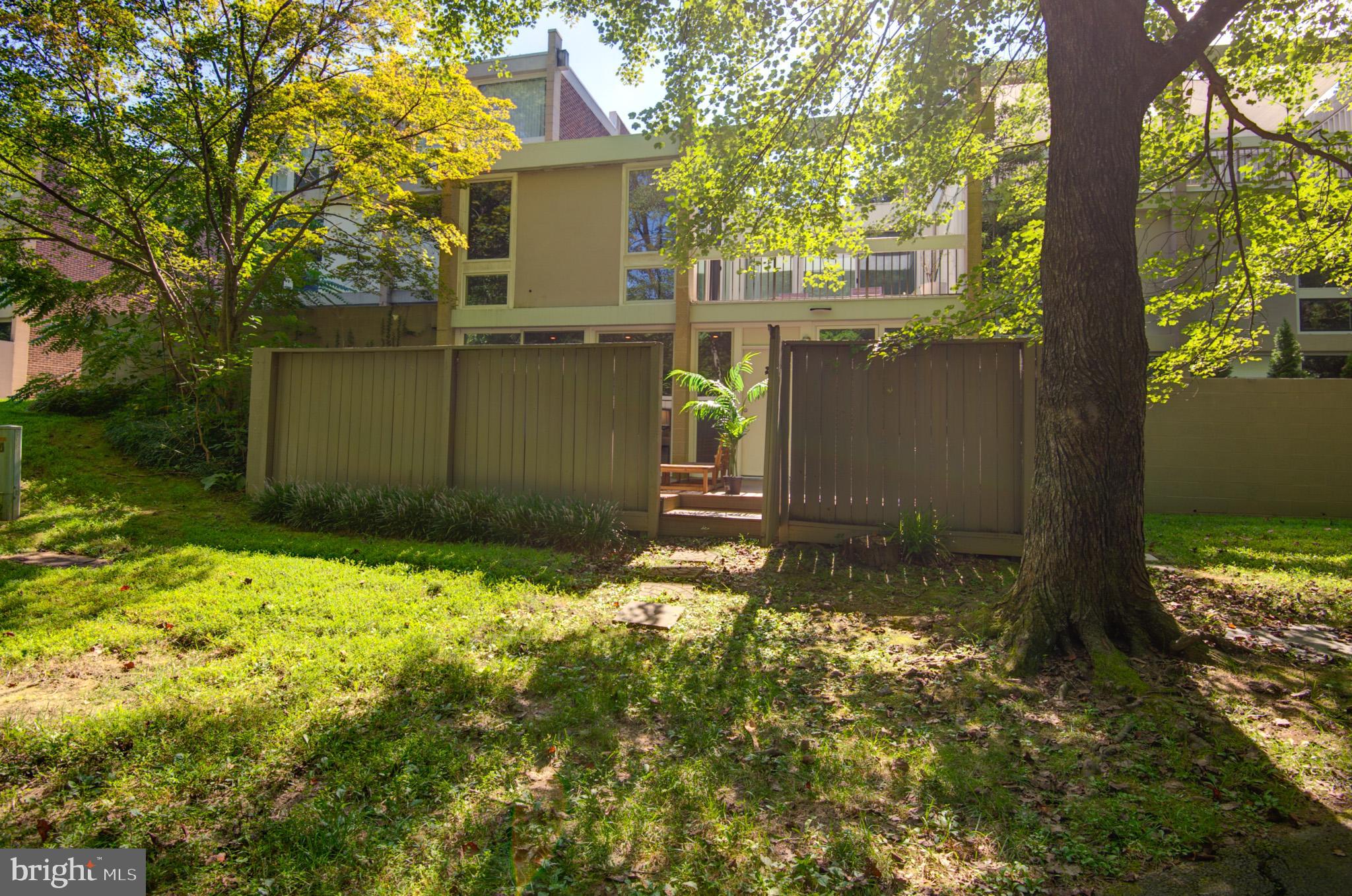 11533 Maple Ridge Road Reston, VA 20190 - Photo 39 of 48 Serene backyard retreat with lush greenery.