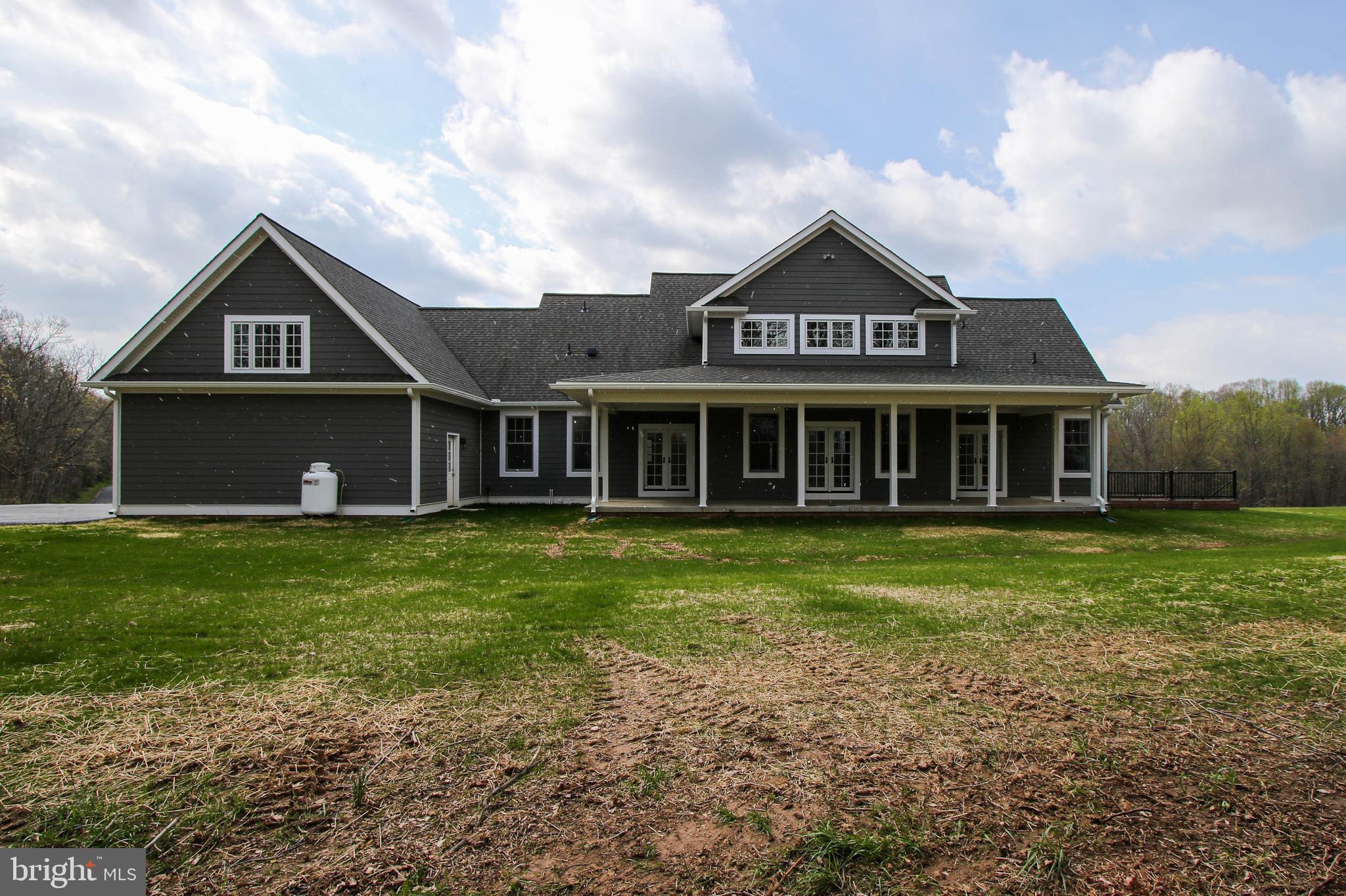 14442 Liberty Road Mount Airy, MD 21771 - Photo 2 of 51 View of house/covered patio from rear yard