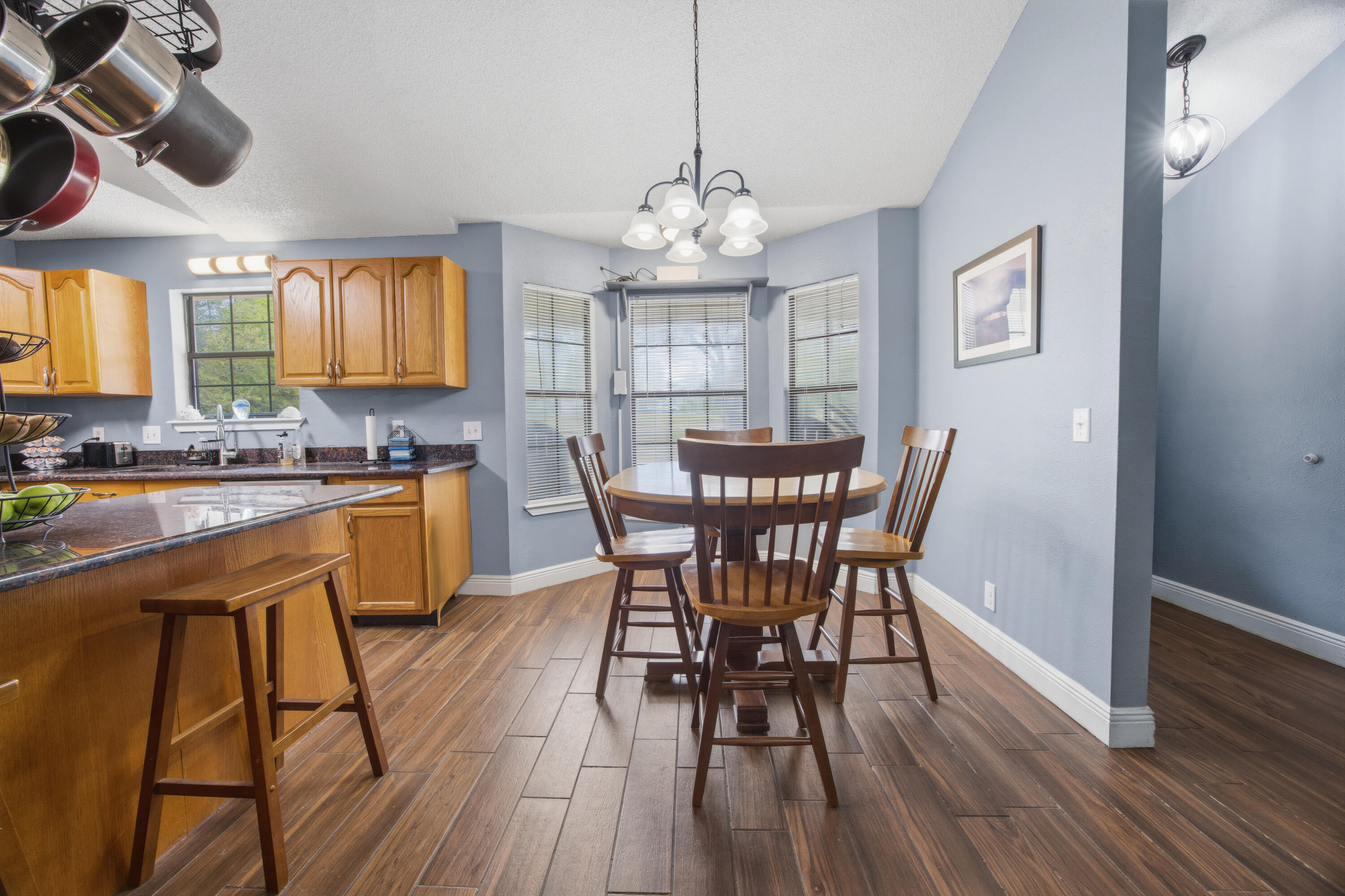3494 Highway 90 Crestview, FL 32539 - Photo 12 of 71 a view of a dining room with furniture window and wooden floor