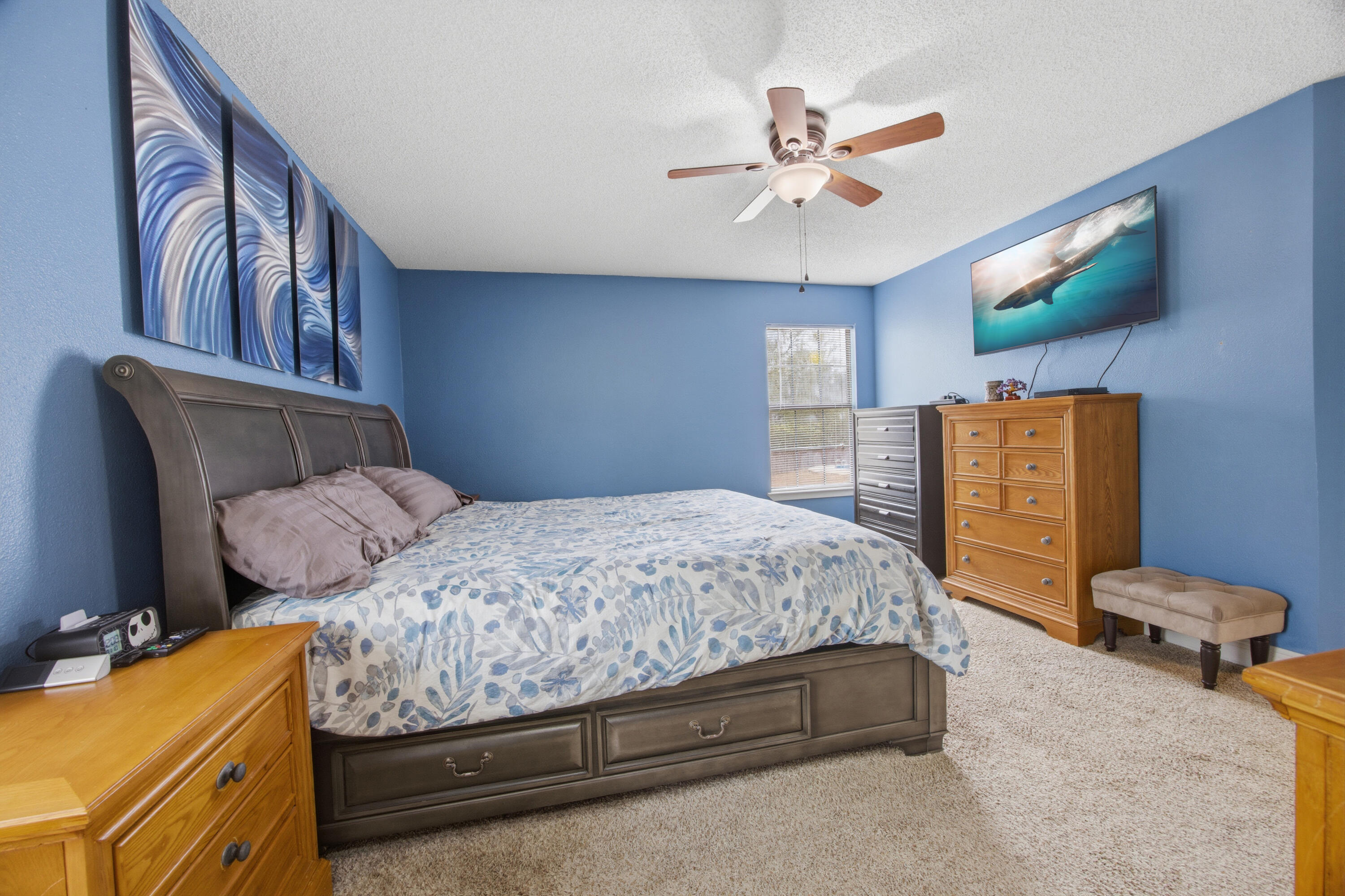 3494 Highway 90 Crestview, FL 32539 - Photo 22 of 71 a bedroom with a bed and ceiling fan