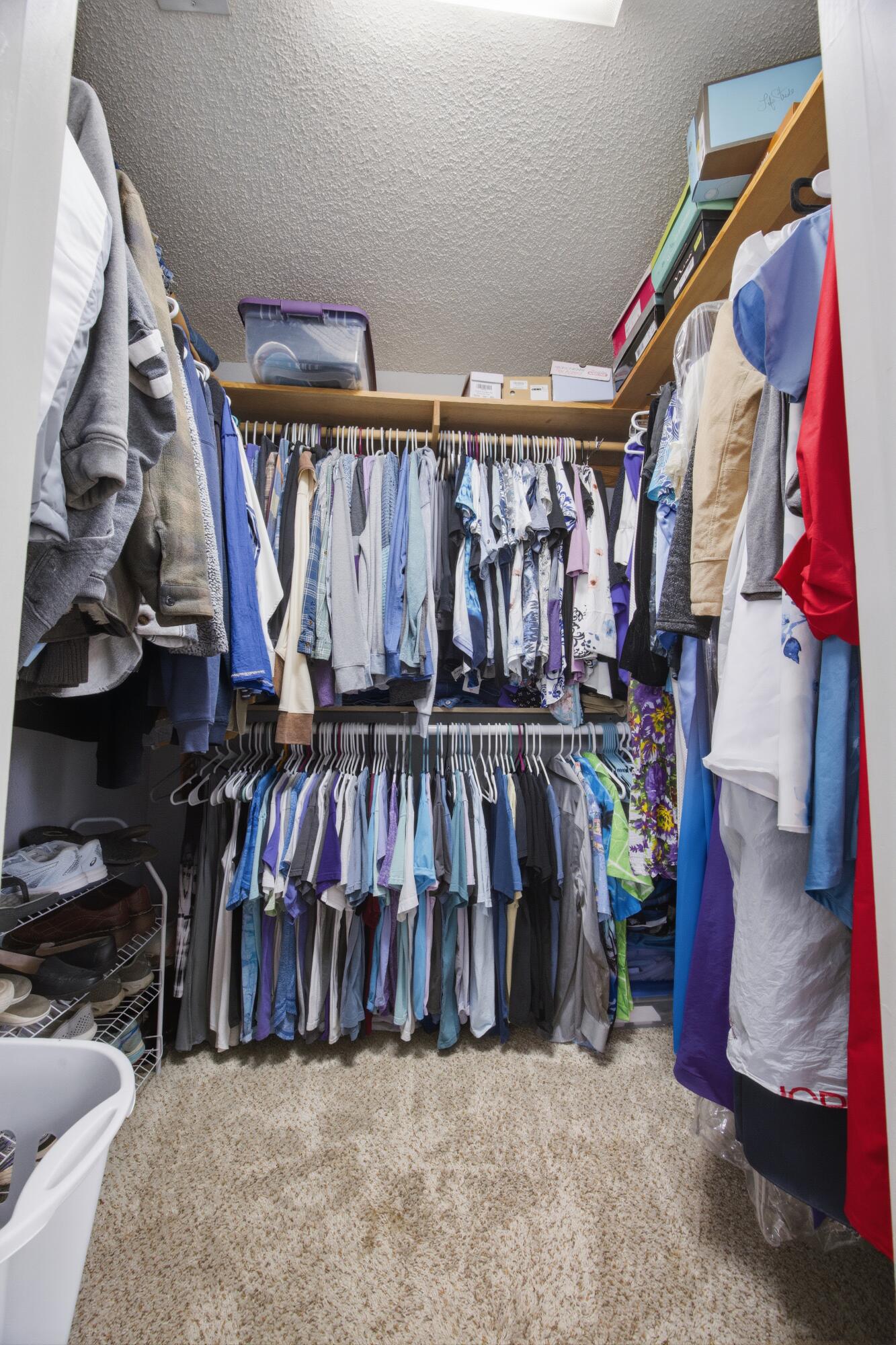 3494 Highway 90 Crestview, FL 32539 - Photo 23 of 71 a view of walk in closet with clothes and shoes