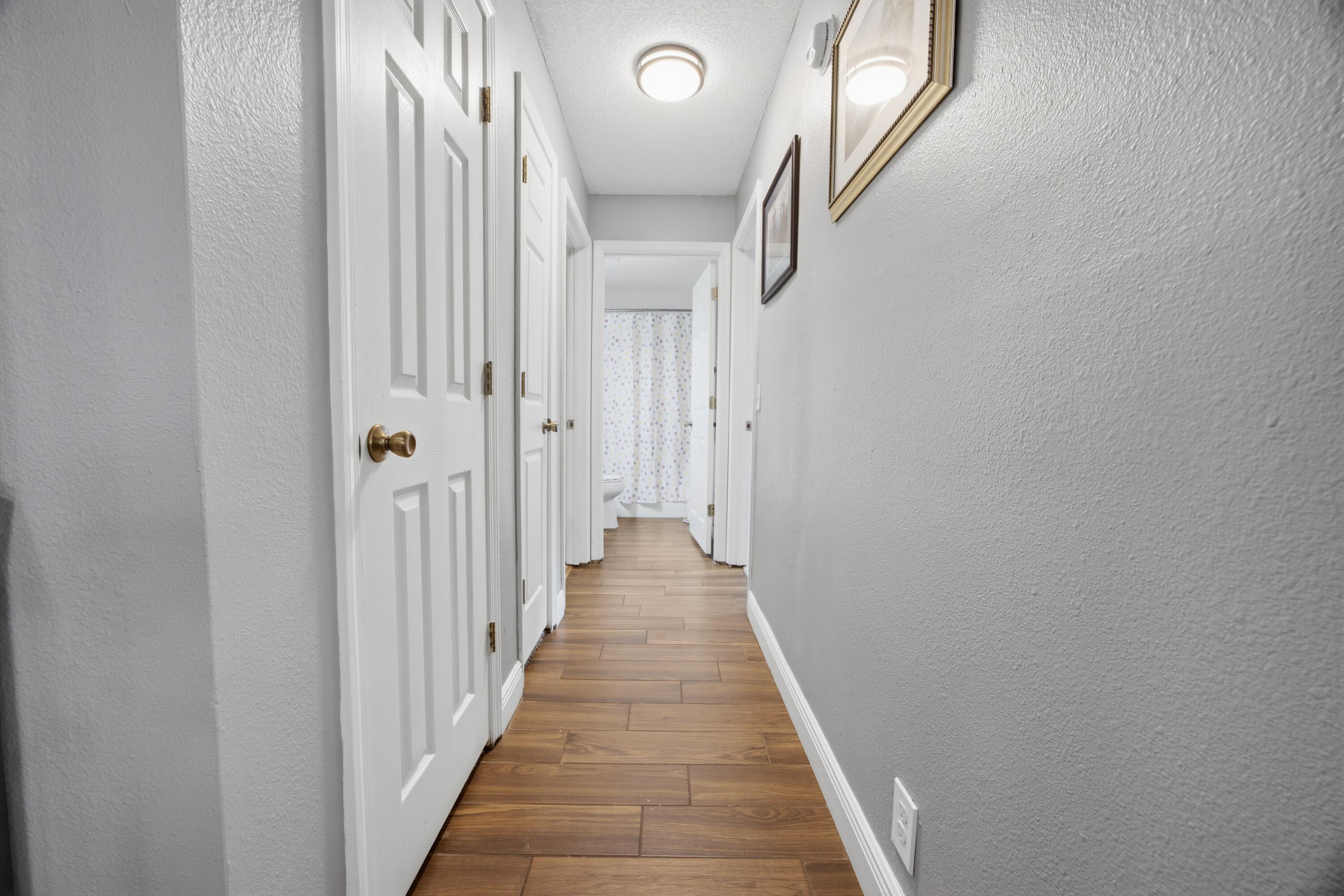 3494 Highway 90 Crestview, FL 32539 - Photo 33 of 71 a view of a hallway with wooden floor and entryway