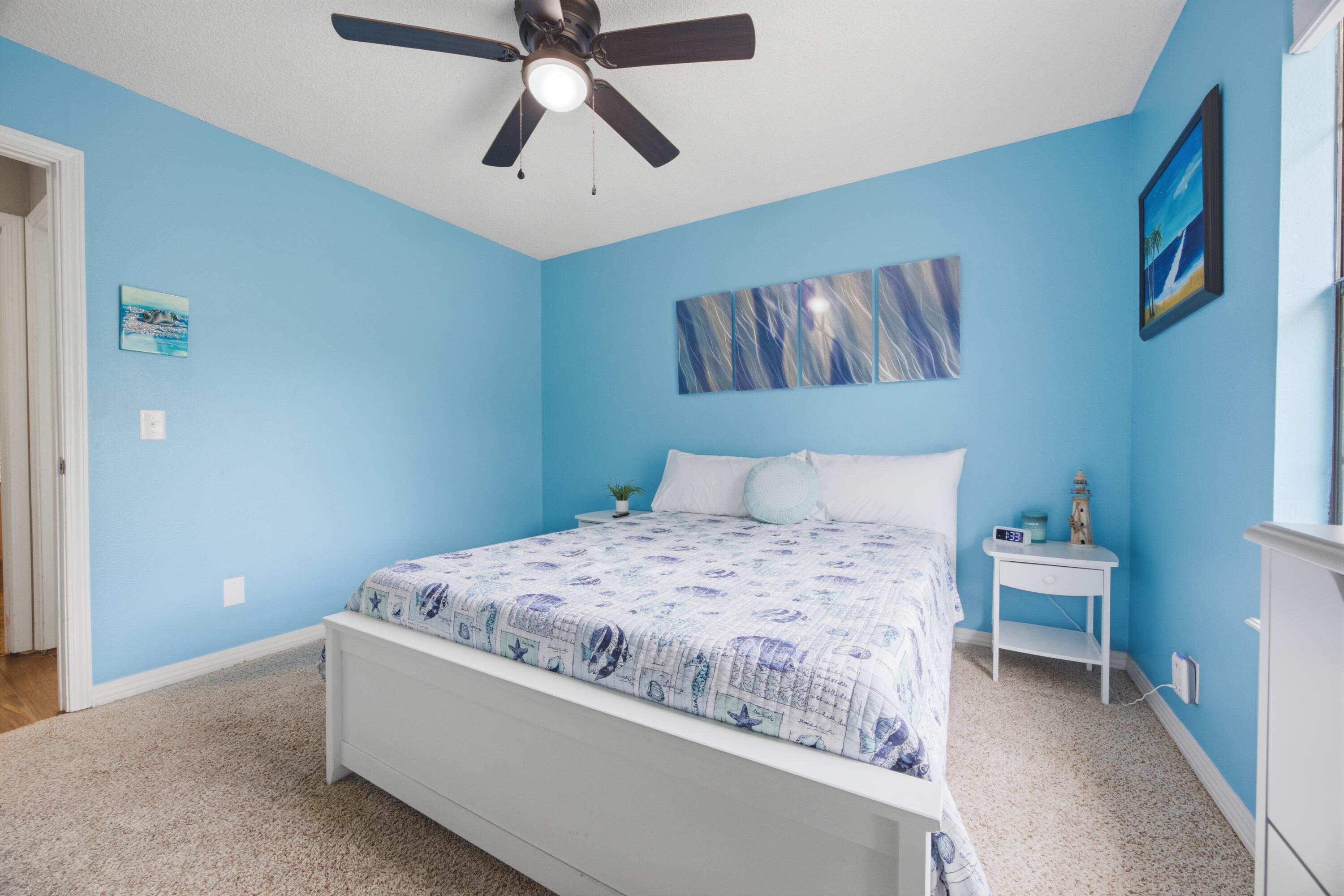 3494 Highway 90 Crestview, FL 32539 - Photo 35 of 71 a bedroom with a bed and a chandelier