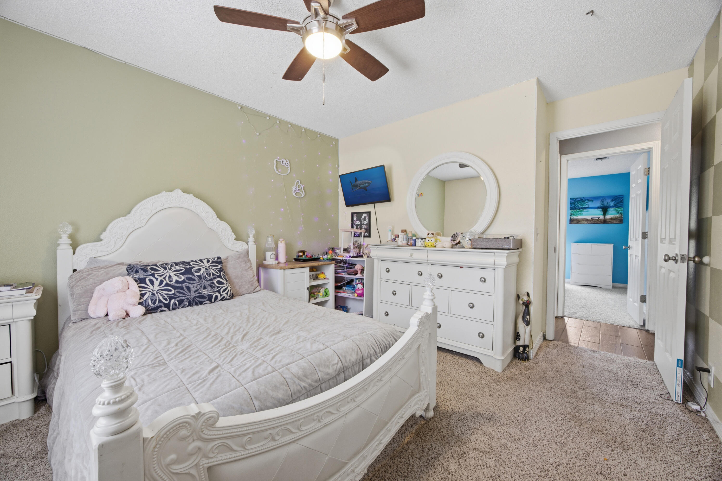 3494 Highway 90 Crestview, FL 32539 - Photo 41 of 71 a bedroom with a bed and a chandelier