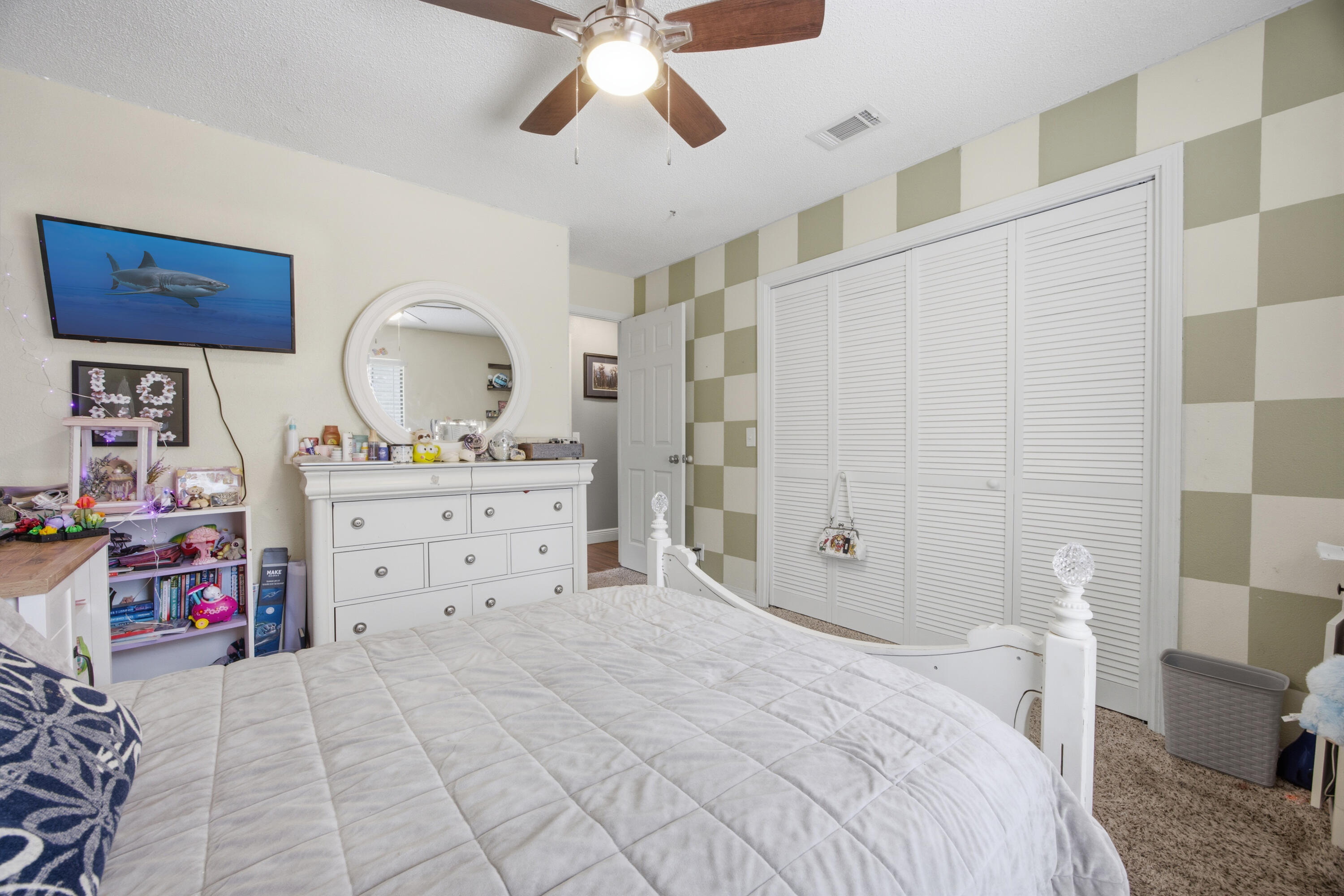 3494 Highway 90 Crestview, FL 32539 - Photo 42 of 71 a bedroom with a bed and a dresser