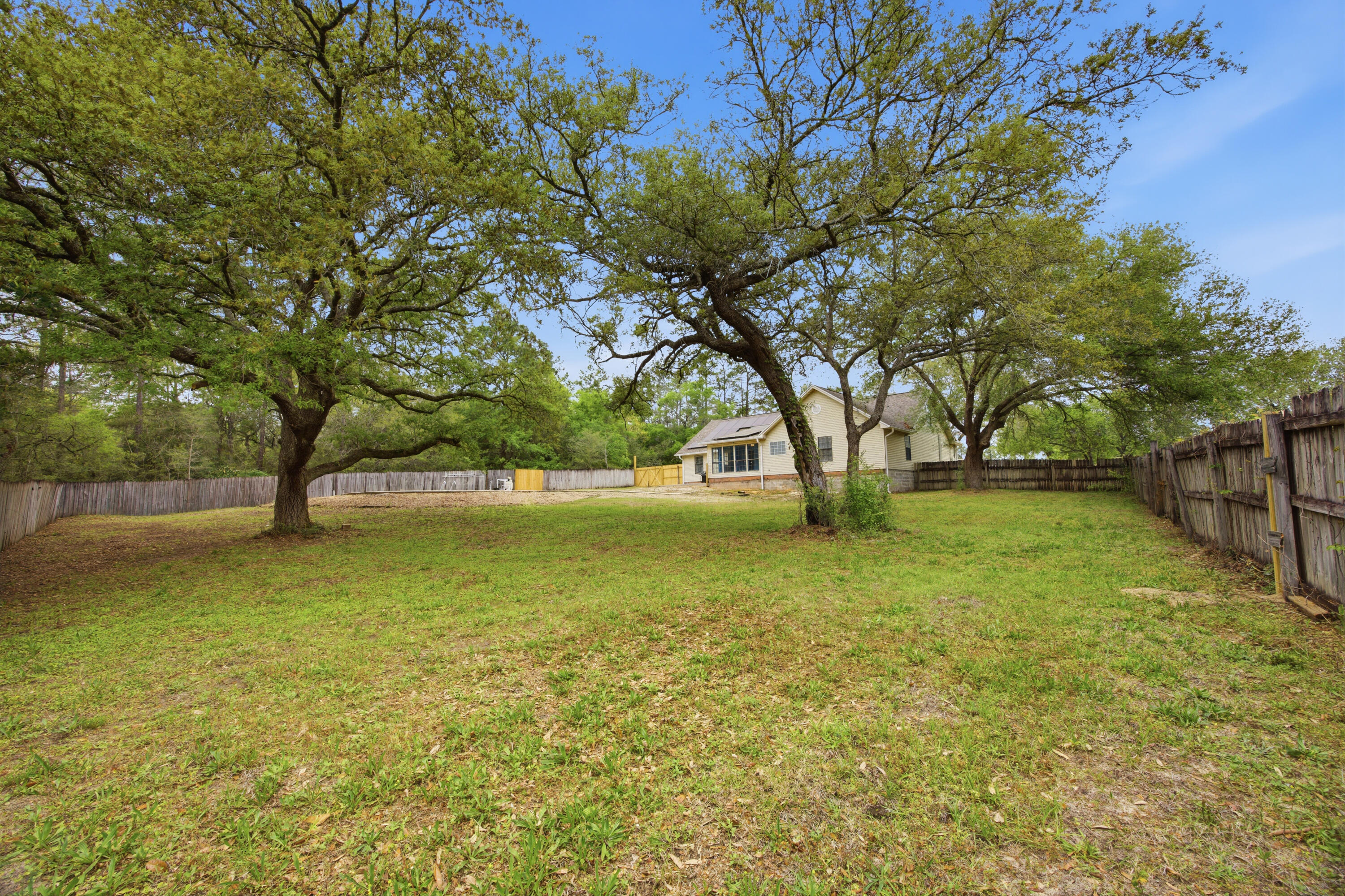 3494 Highway 90 Crestview, FL 32539 - Photo 61 of 71 a view of outdoor space with deck and trees